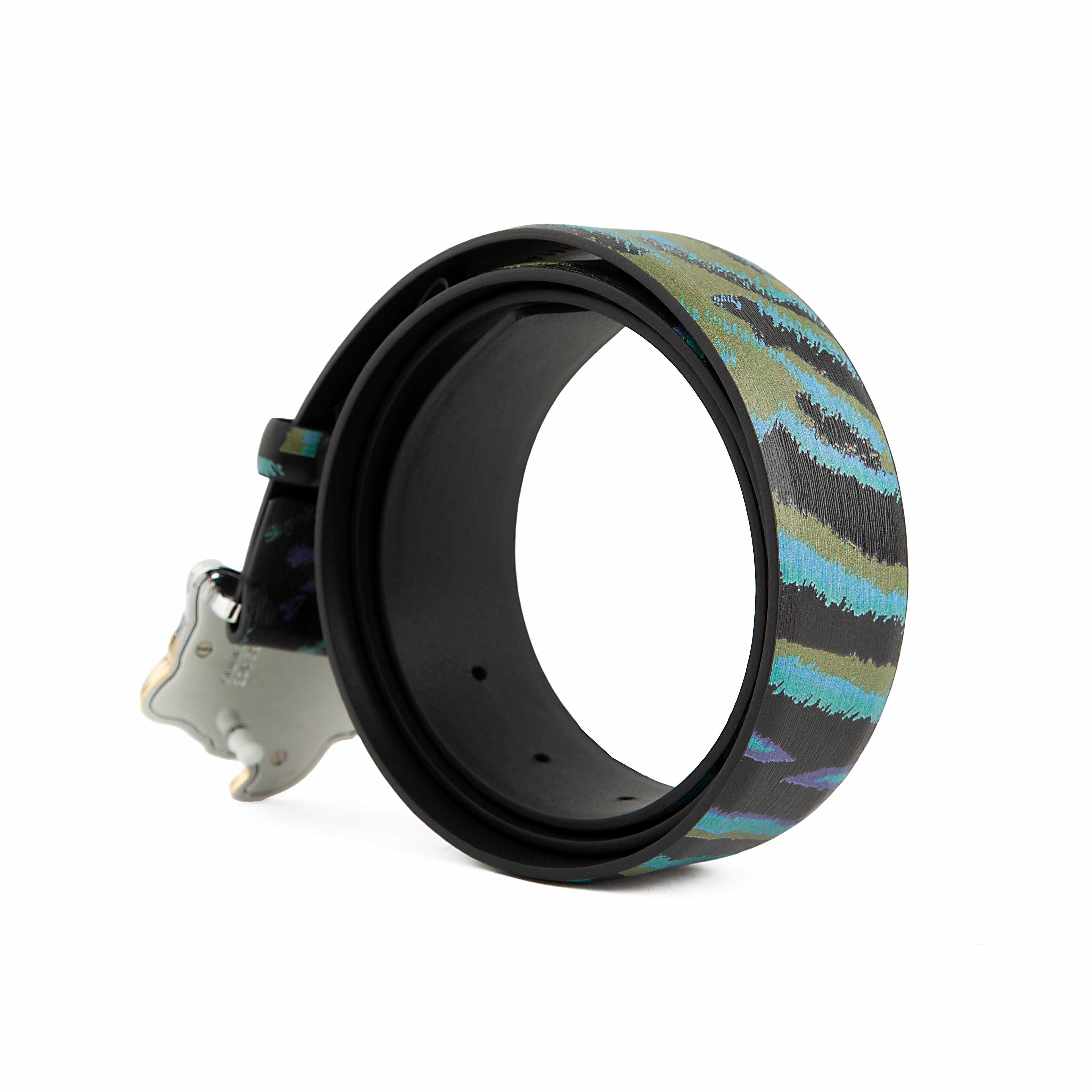 This statement accessory blends bold contemporary art with high-fashion heritage.
