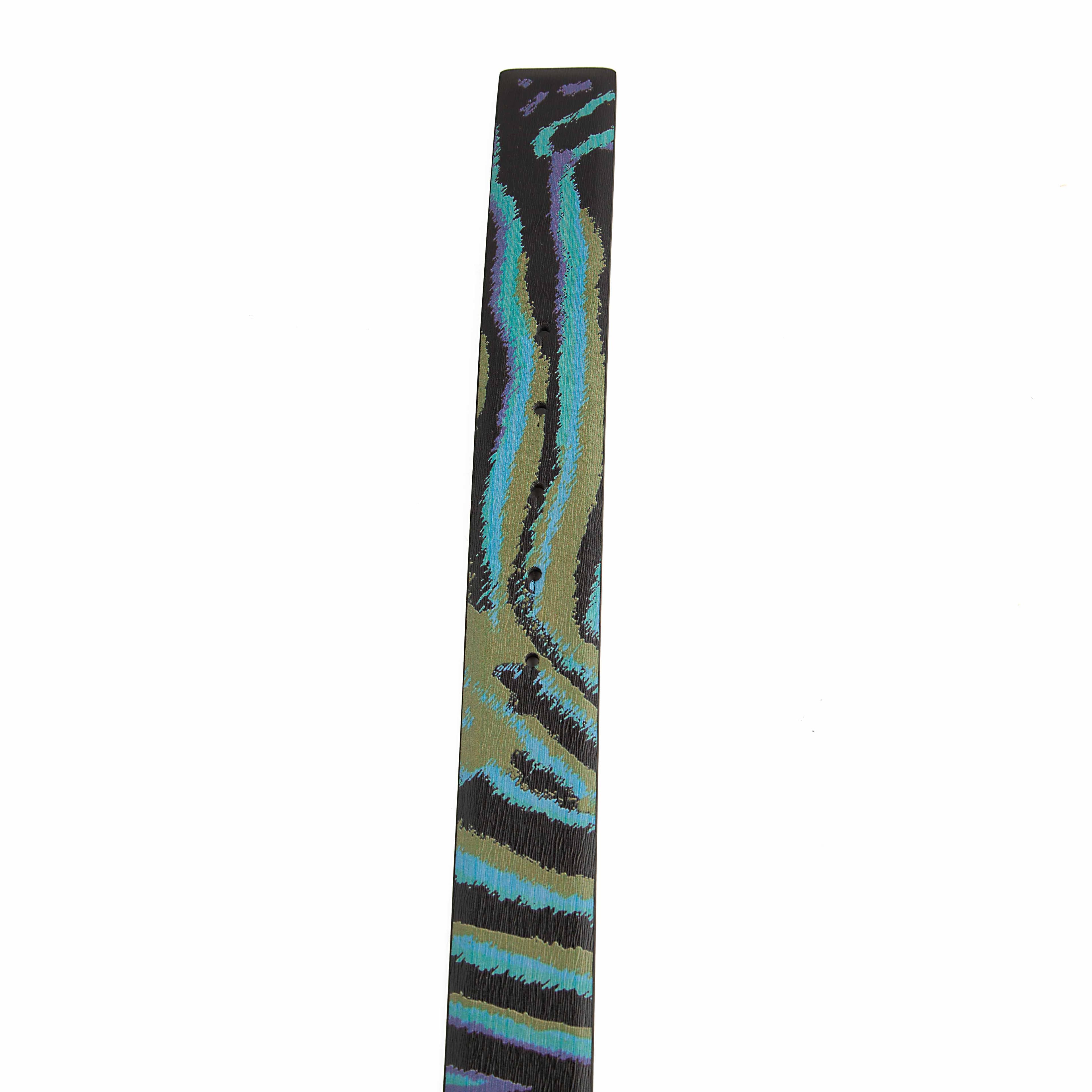 This statement accessory blends bold contemporary art with high-fashion heritage.