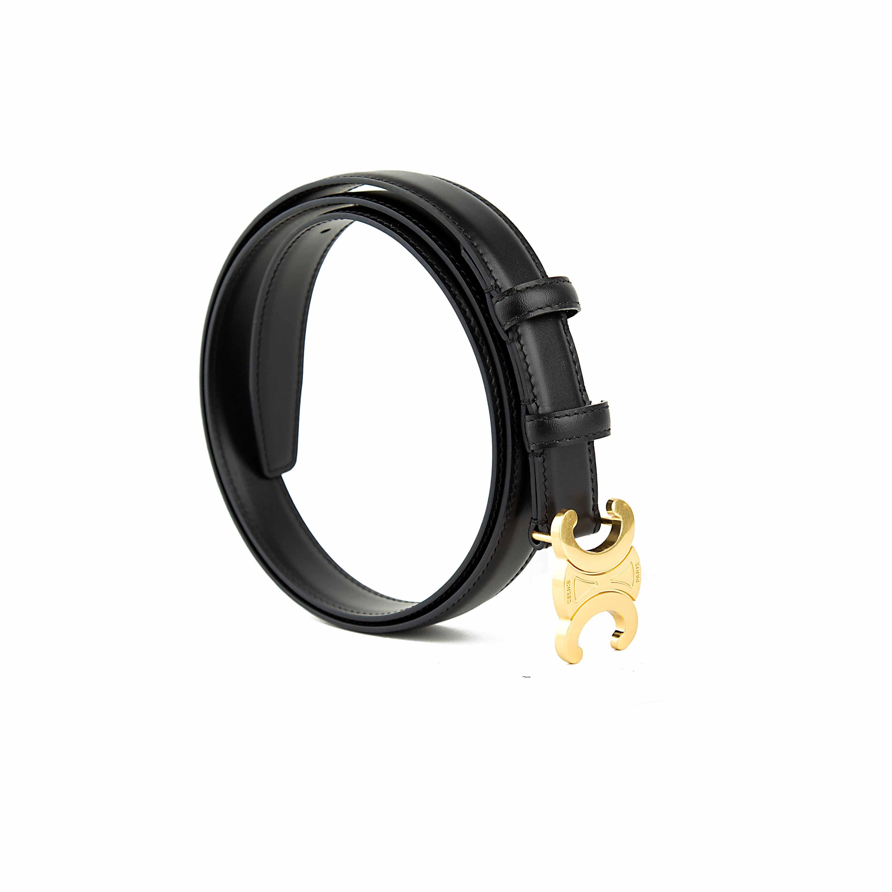 This elegant accessory is a masterclass in understated luxury, featuring a smooth, semi-matte black calfskin leather strap.