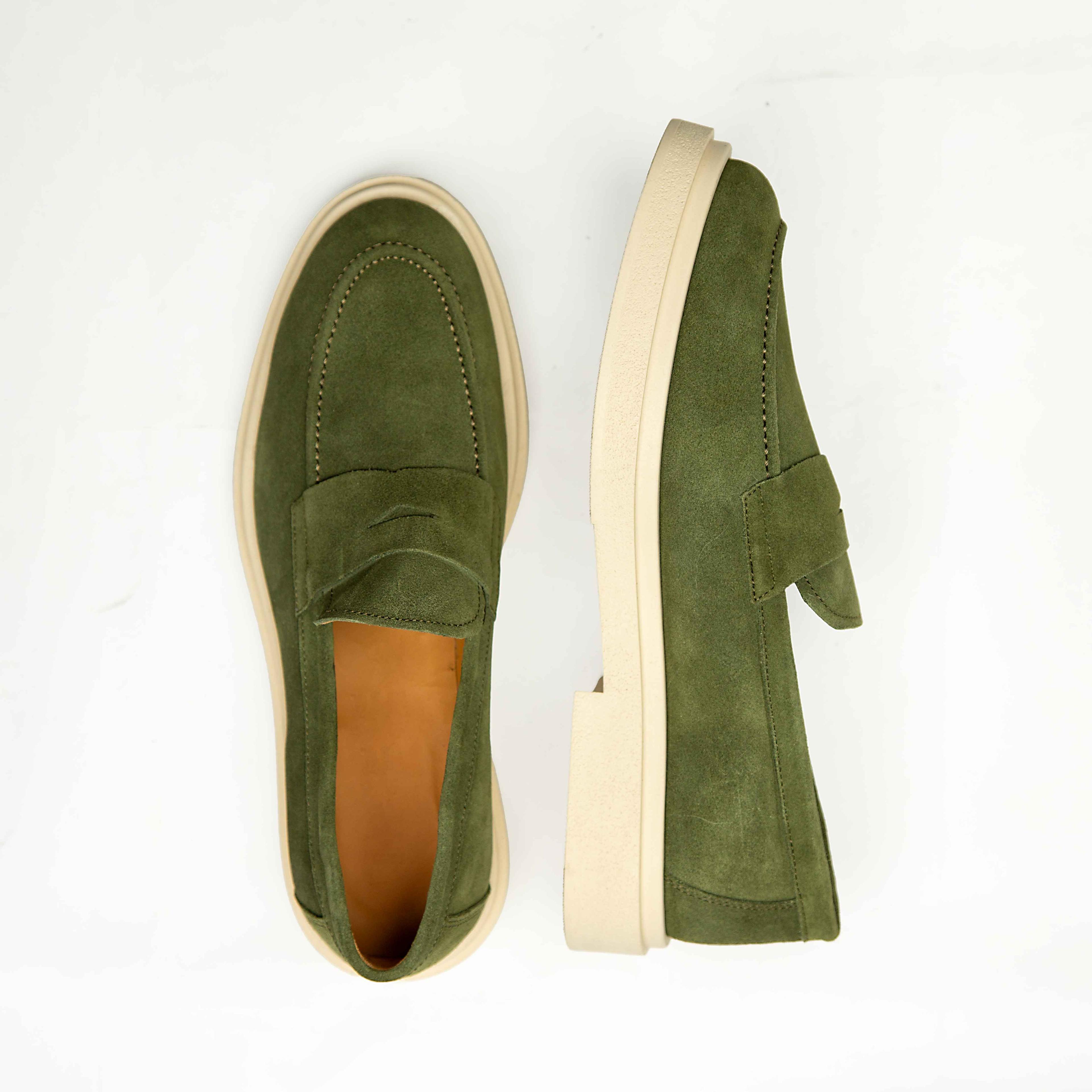 Agu & Sons Ltd olive green suede penny loafers featuring a thick cream platform rubber sole, isolated on a white background.