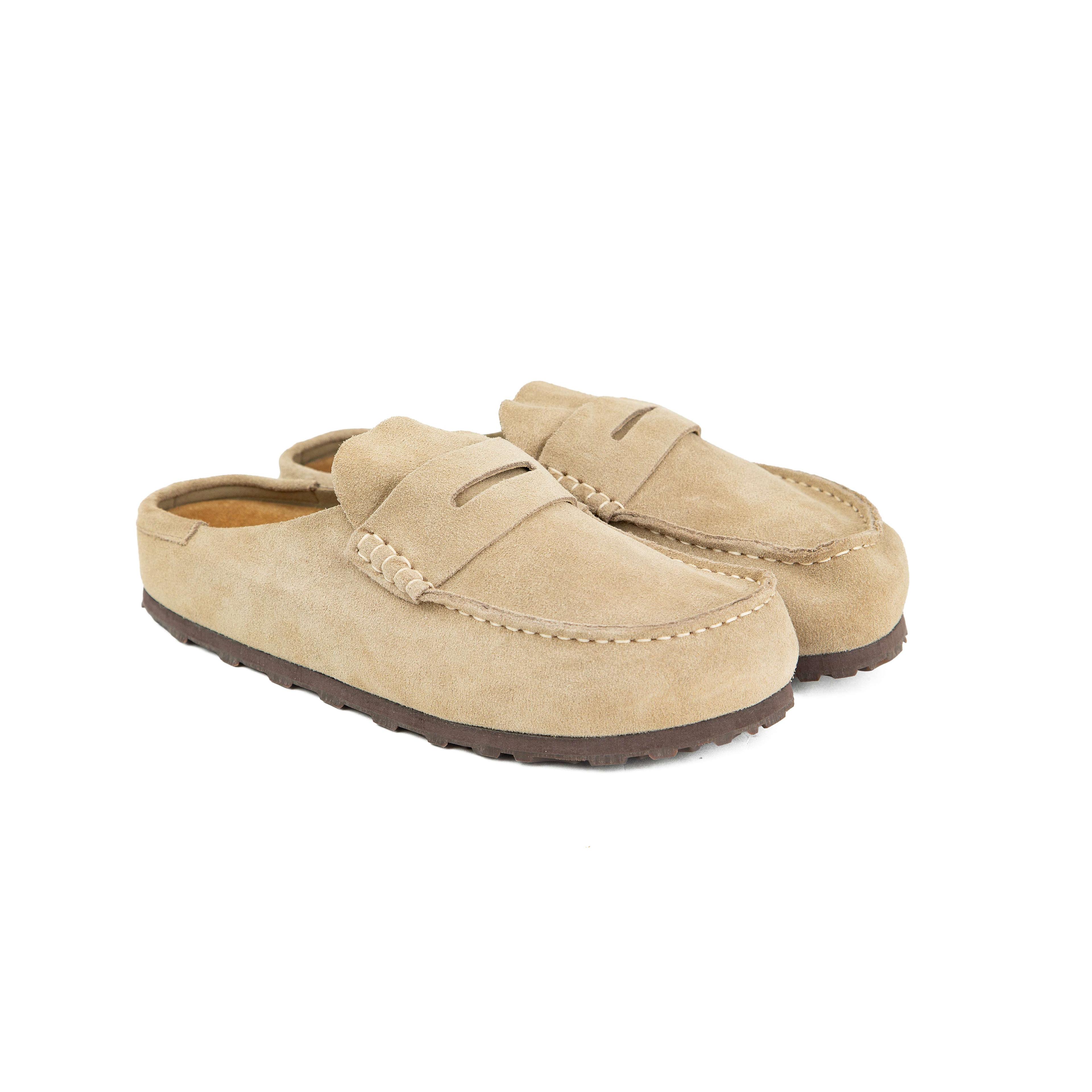 Discover ultimate comfort with our Sand Suede Penny Loafer Mules.