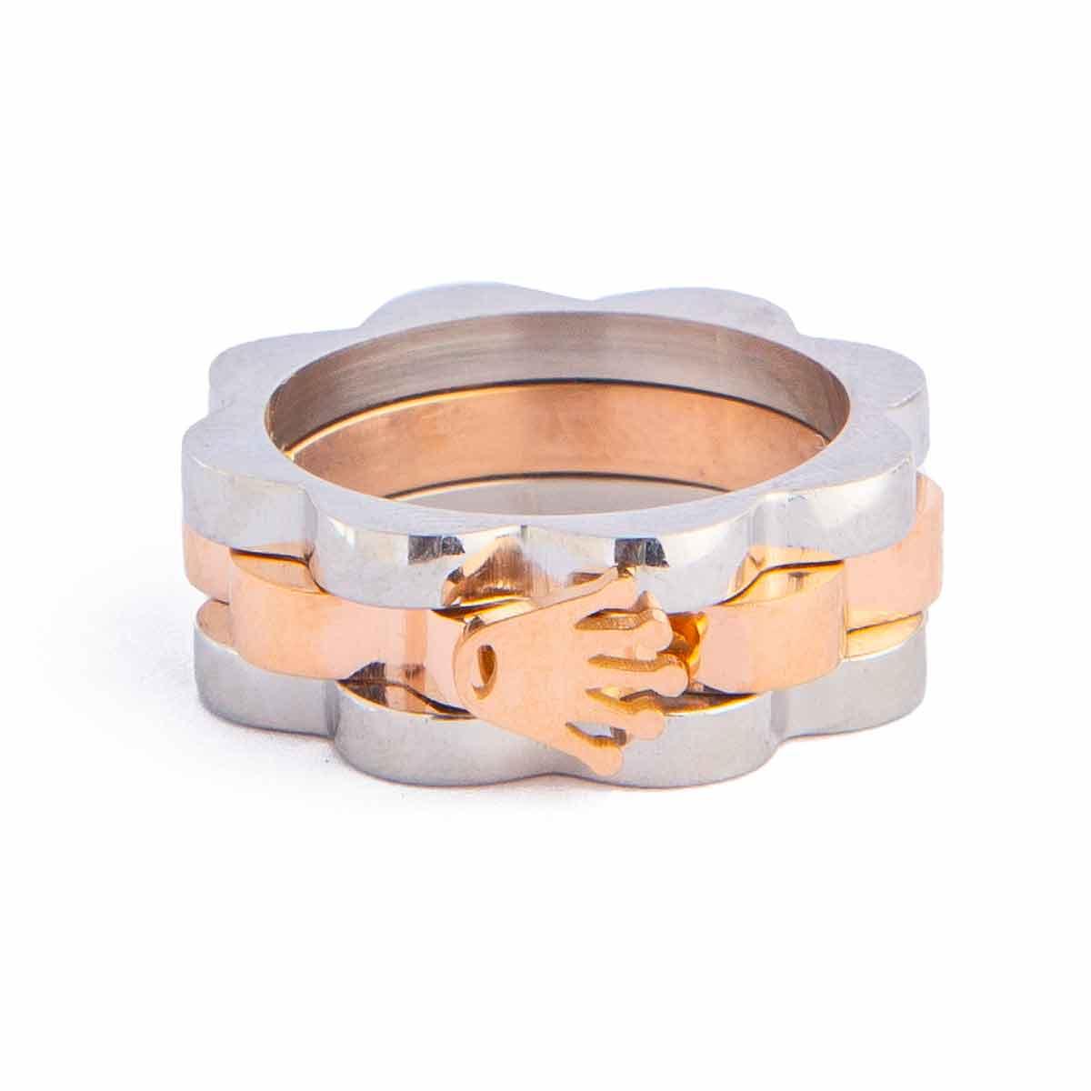 Intertwined Hands Stacking Ring Set. Silver and rose gold rings with interlocking hands design. Unique and symbolic jewelry.
