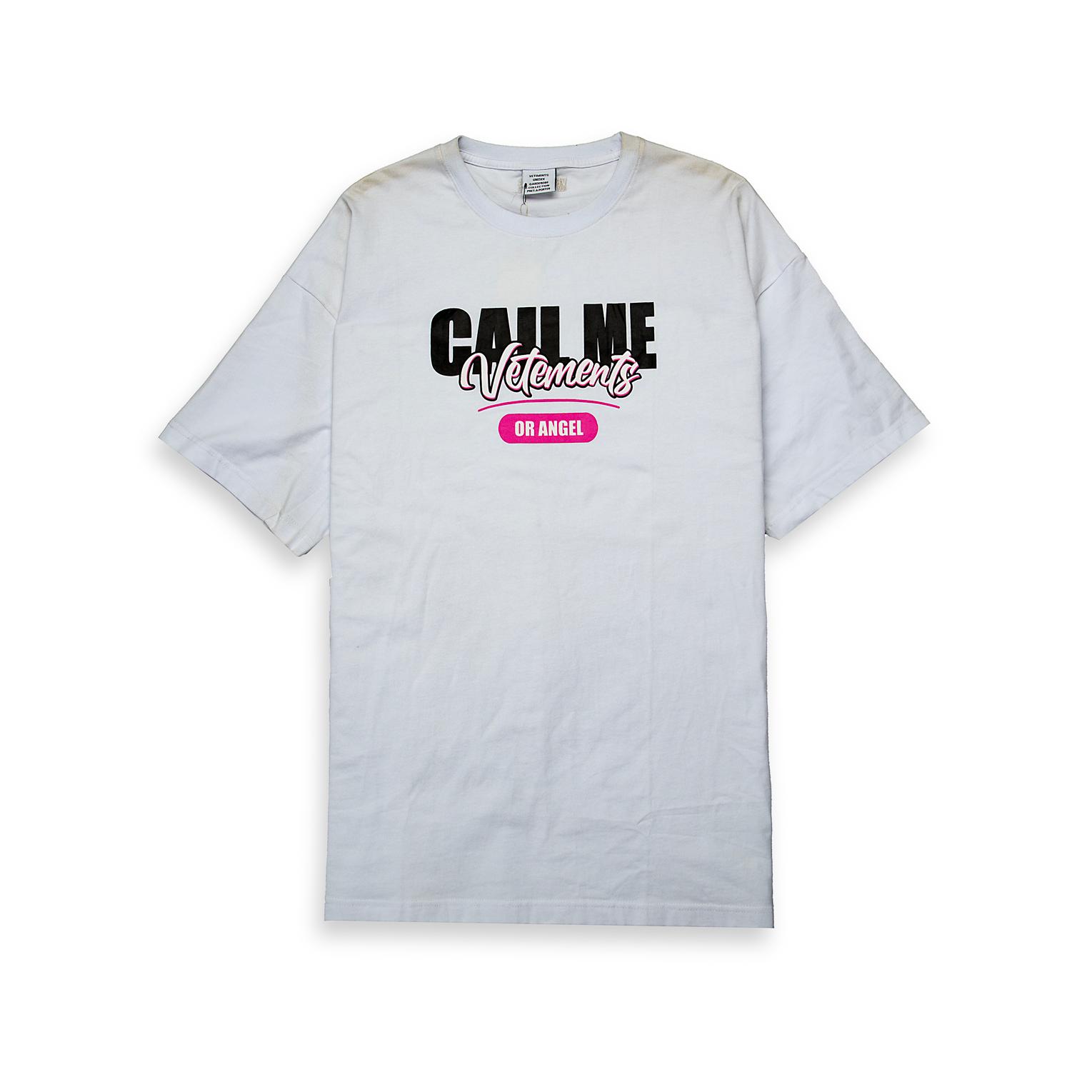  This is a white, short-sleeve crew-neck t-shirt featuring a bold, playful, and high-fashion inspired graphic slogan.