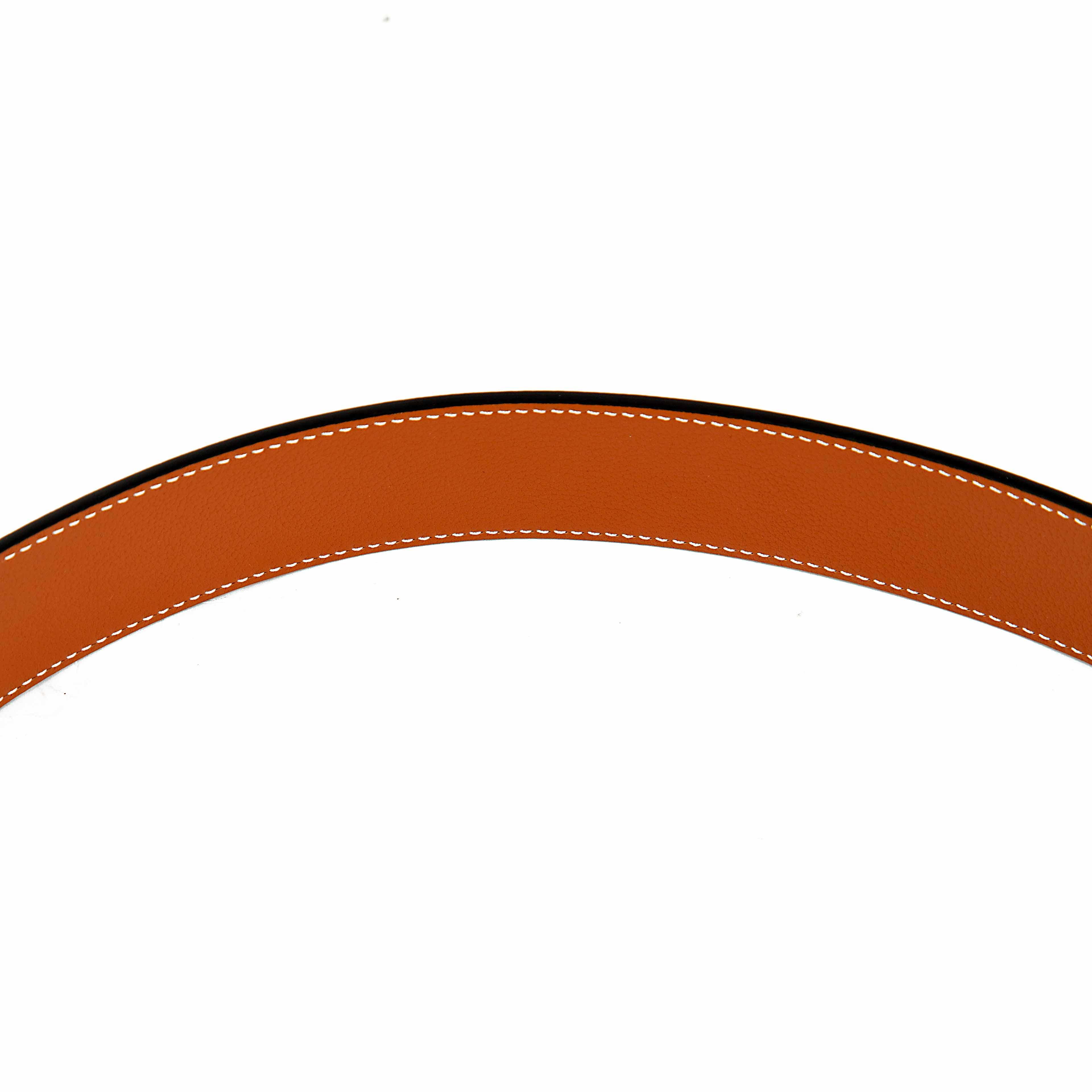 Designed with a reversible contrast lining, the belt offers two distinct looks: a textured brown for a relaxed yet polished feel, and a smooth black for formal occasions.