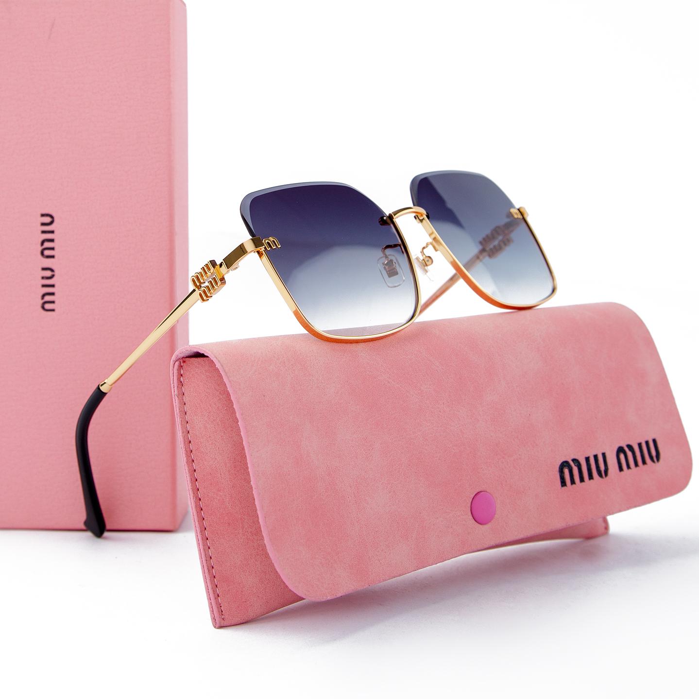 Miu Miu square sunglasses with gold frame and gradient blue lenses, featuring a luxury design. men's fashion accessory with UV protection and style.