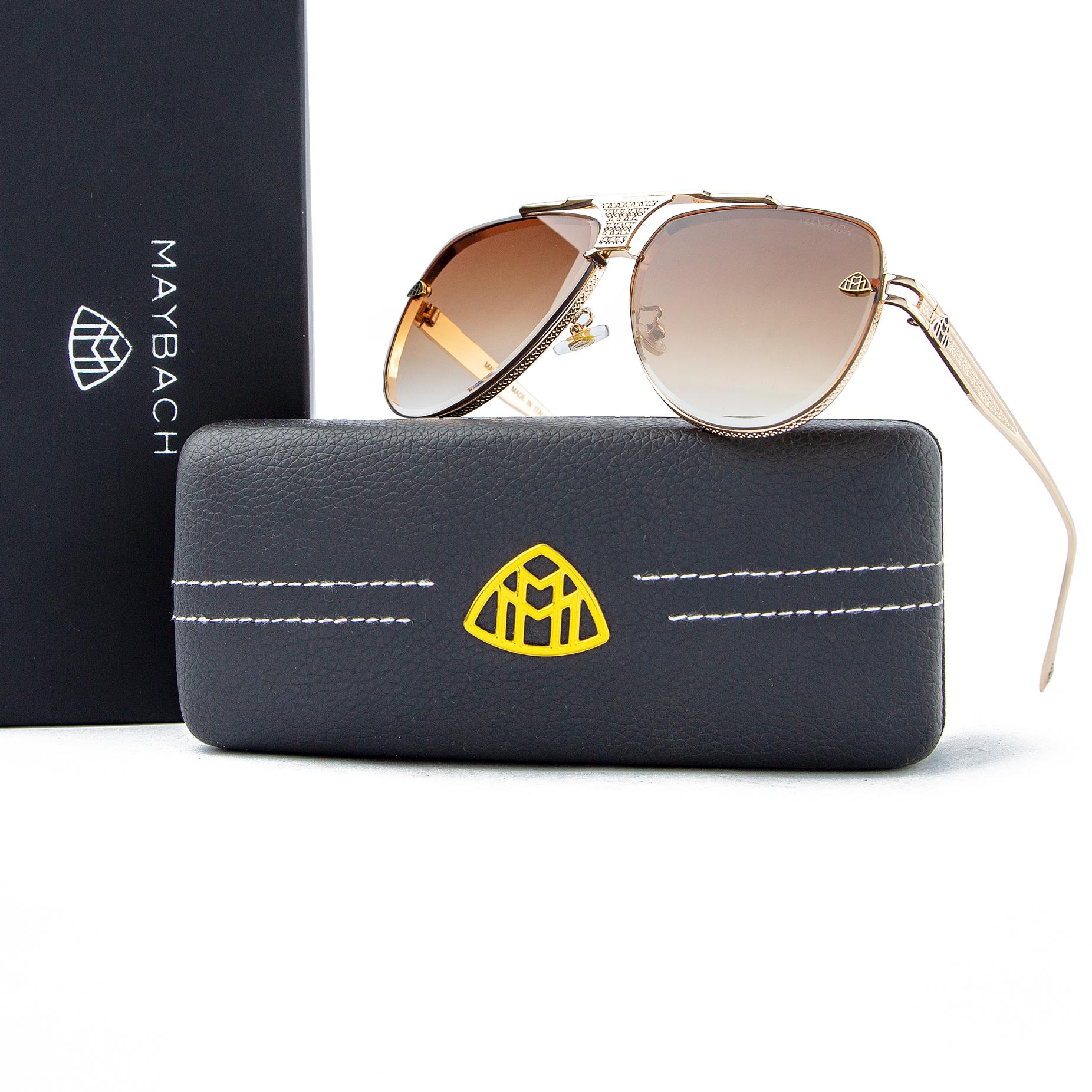 Maybach aviator sunglasses with gold metal frames and gradient brown lenses, unisex design with premium details and iconic Maybach logo