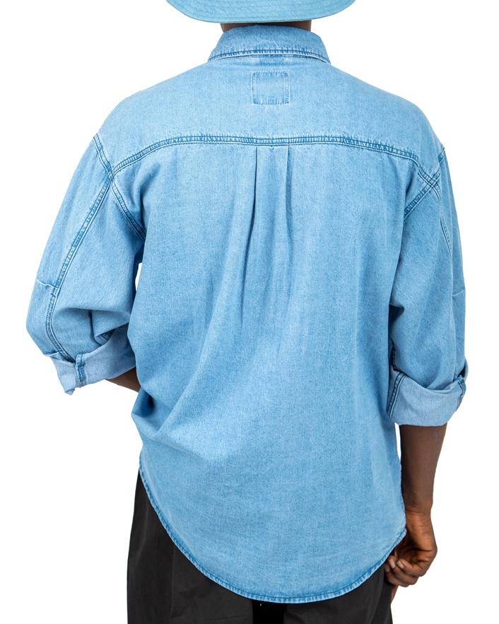 Men's dark blue denim long-sleeved shirt, Isabel Marant Vhelynton model, with button-down closure and chest pockets.