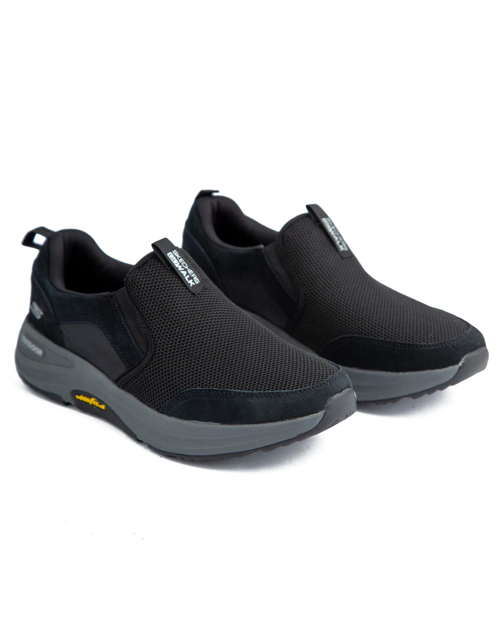Skechers Go Walk Shoes, Black with grey soles, featuring a breathable mesh upper,  and lightweight construction.