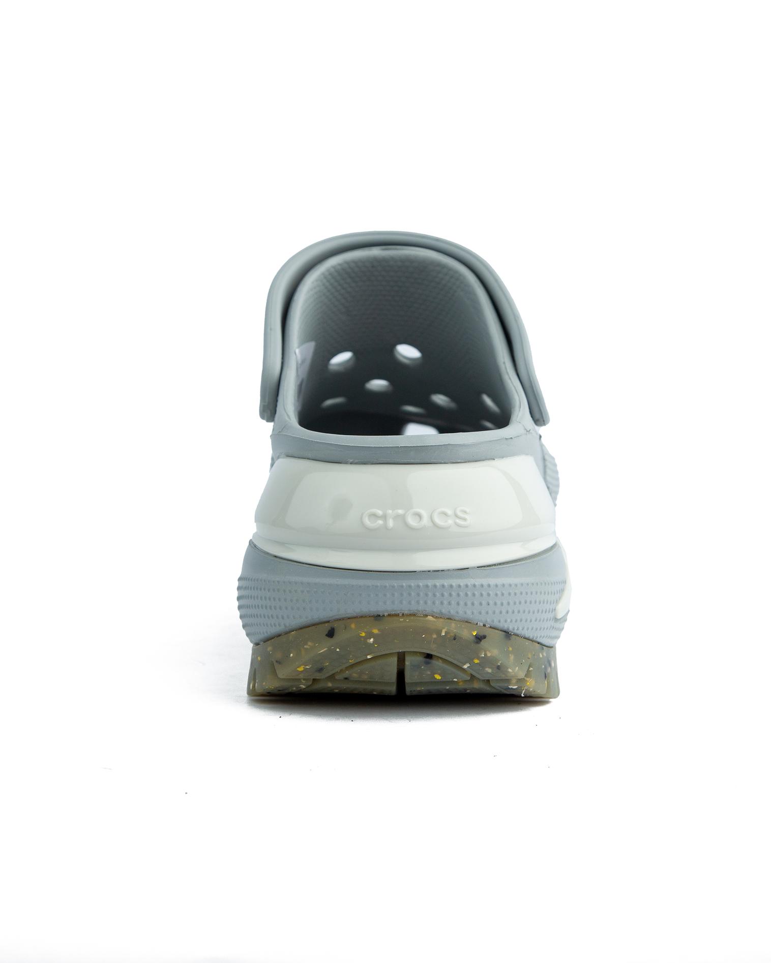 Crocs Mega Crush Clog in light grey, featuring a platform sole with textured detail and ventilation ports.