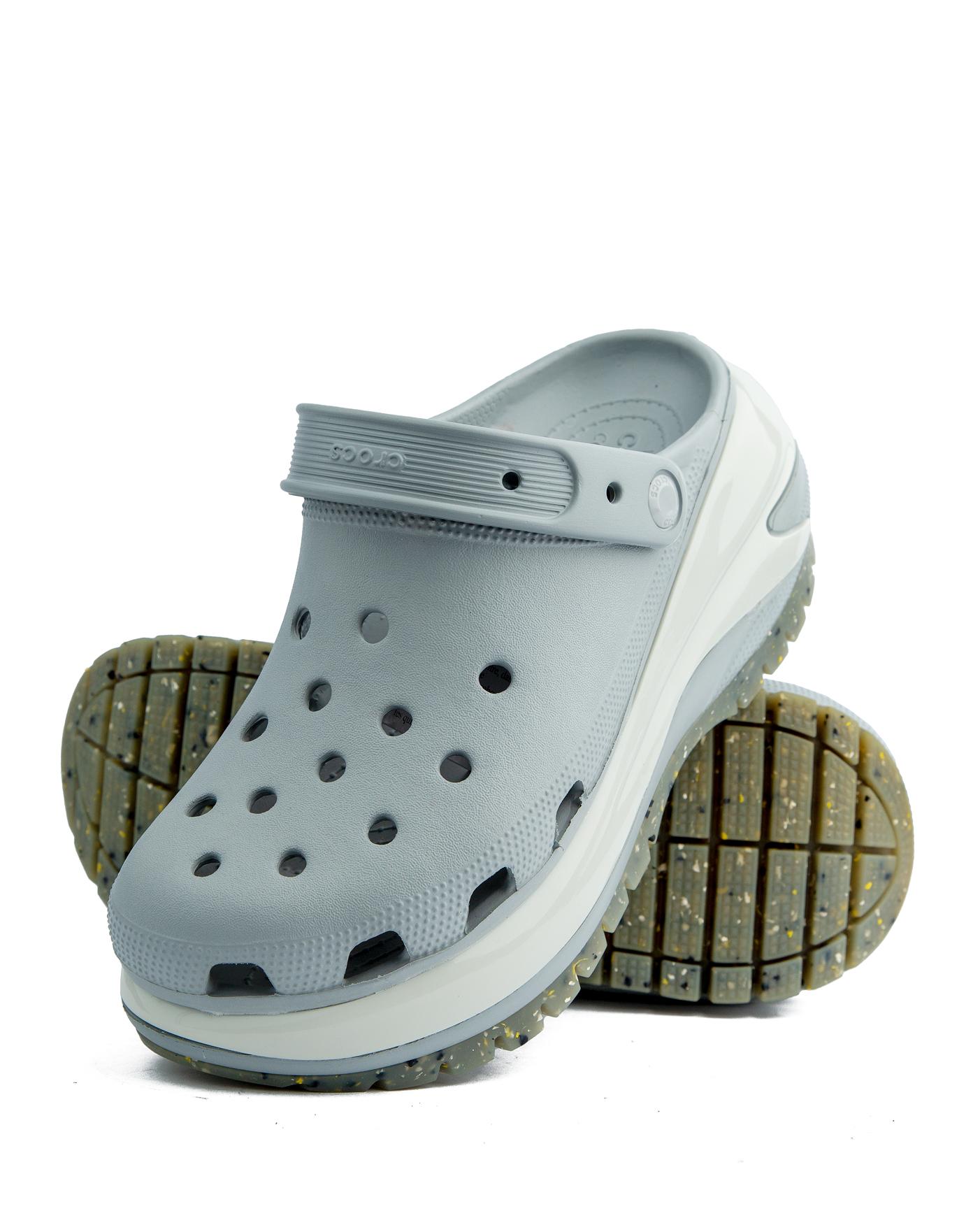 Crocs Mega Crush Clog in light grey, featuring a platform sole with textured detail and ventilation ports.