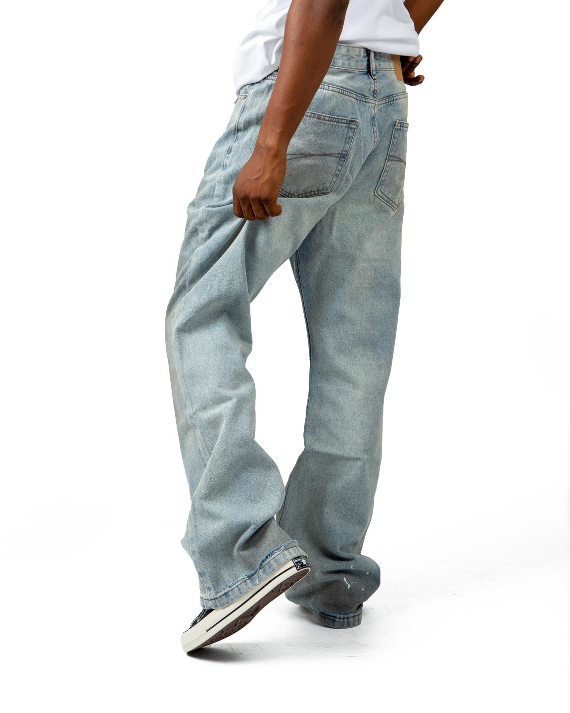 Vintage washed loose-fit denim jeans in light blue. Stylish, comfortable, and perfect for casual outfits. Unisex design with a relaxed, retro feel.