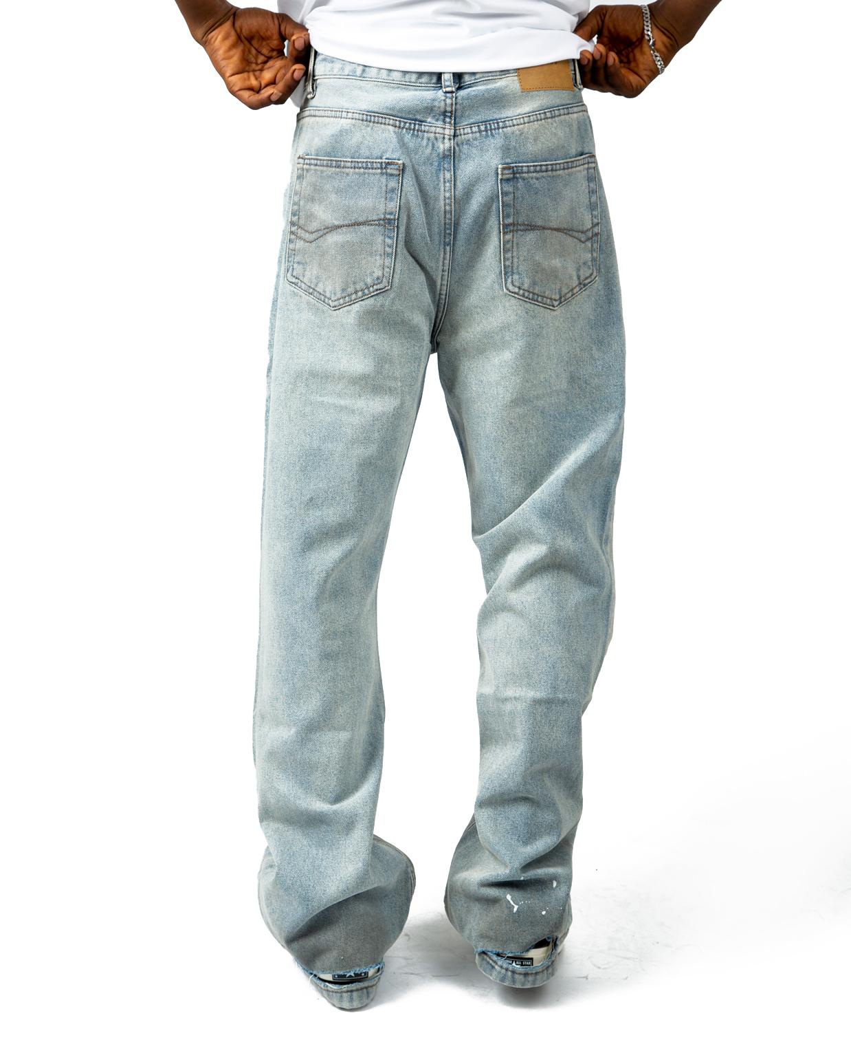 Vintage washed loose-fit denim jeans in light blue. Stylish, comfortable, and perfect for casual outfits. Unisex design with a relaxed, retro feel.