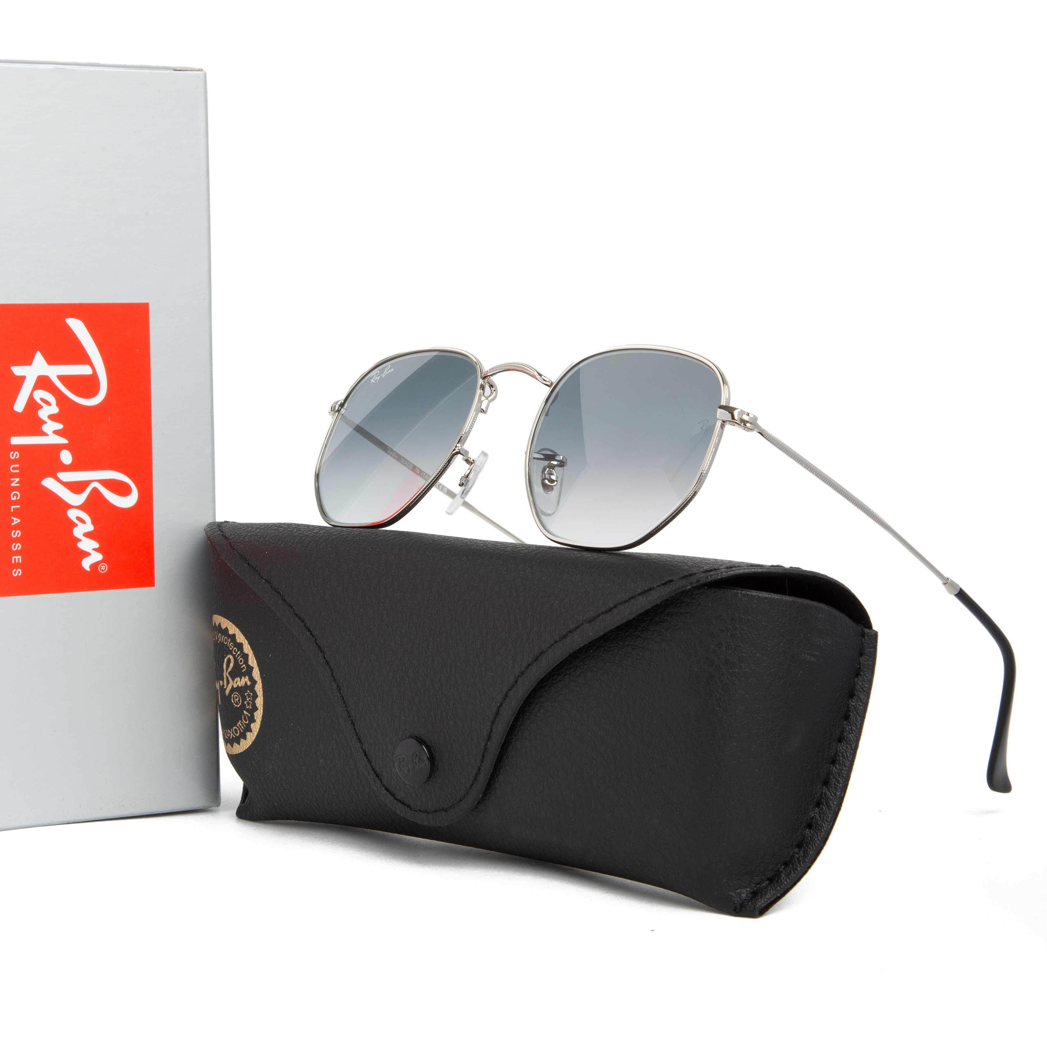 Ray-Ban Hexagonal  Sunglasses with Silver Frame and Blue-Grey Gradient Lenses, Modern Geometric Unisex Design.