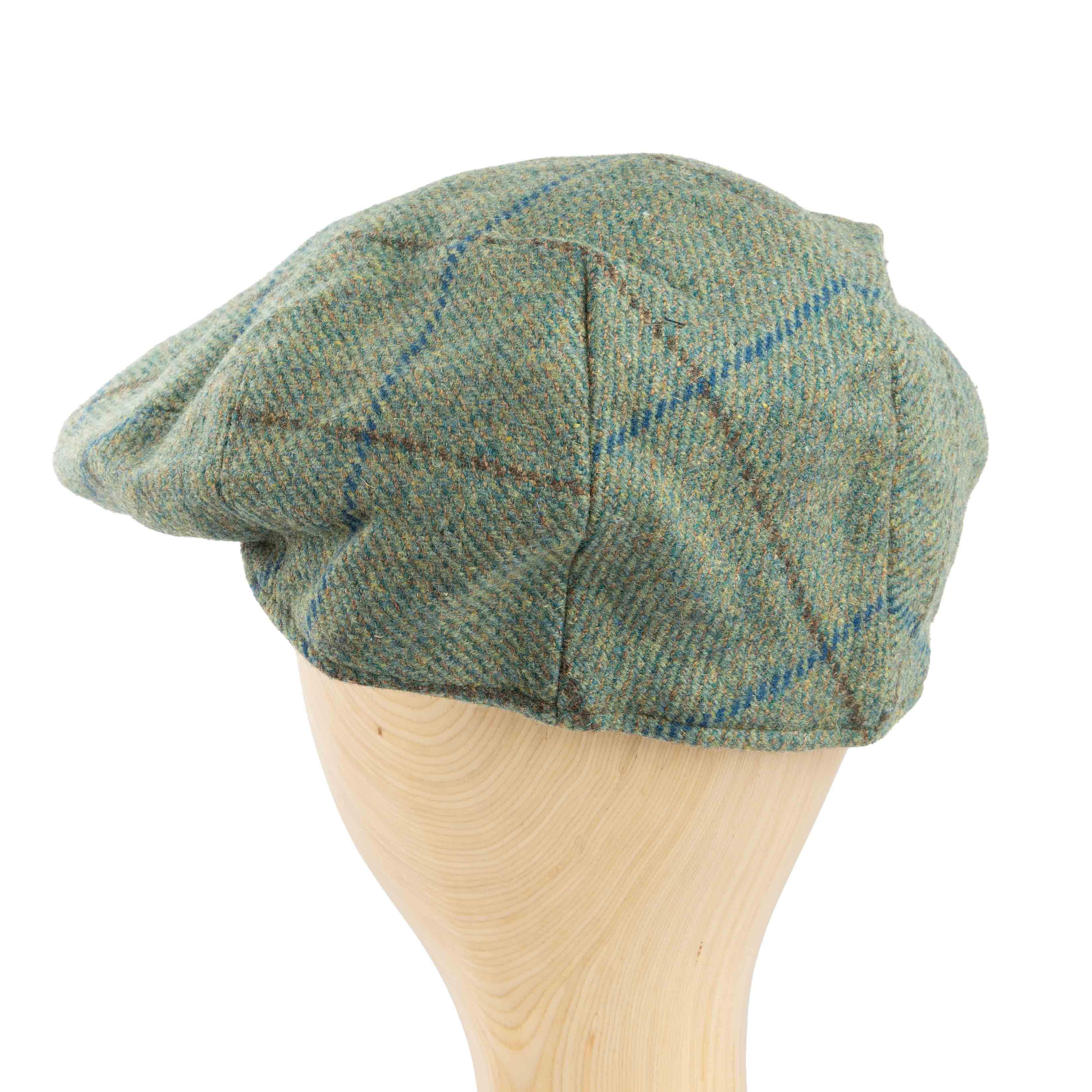 Premium green plaid tweed flat cap for men, ideal for traditional or sophisticated casual wear.