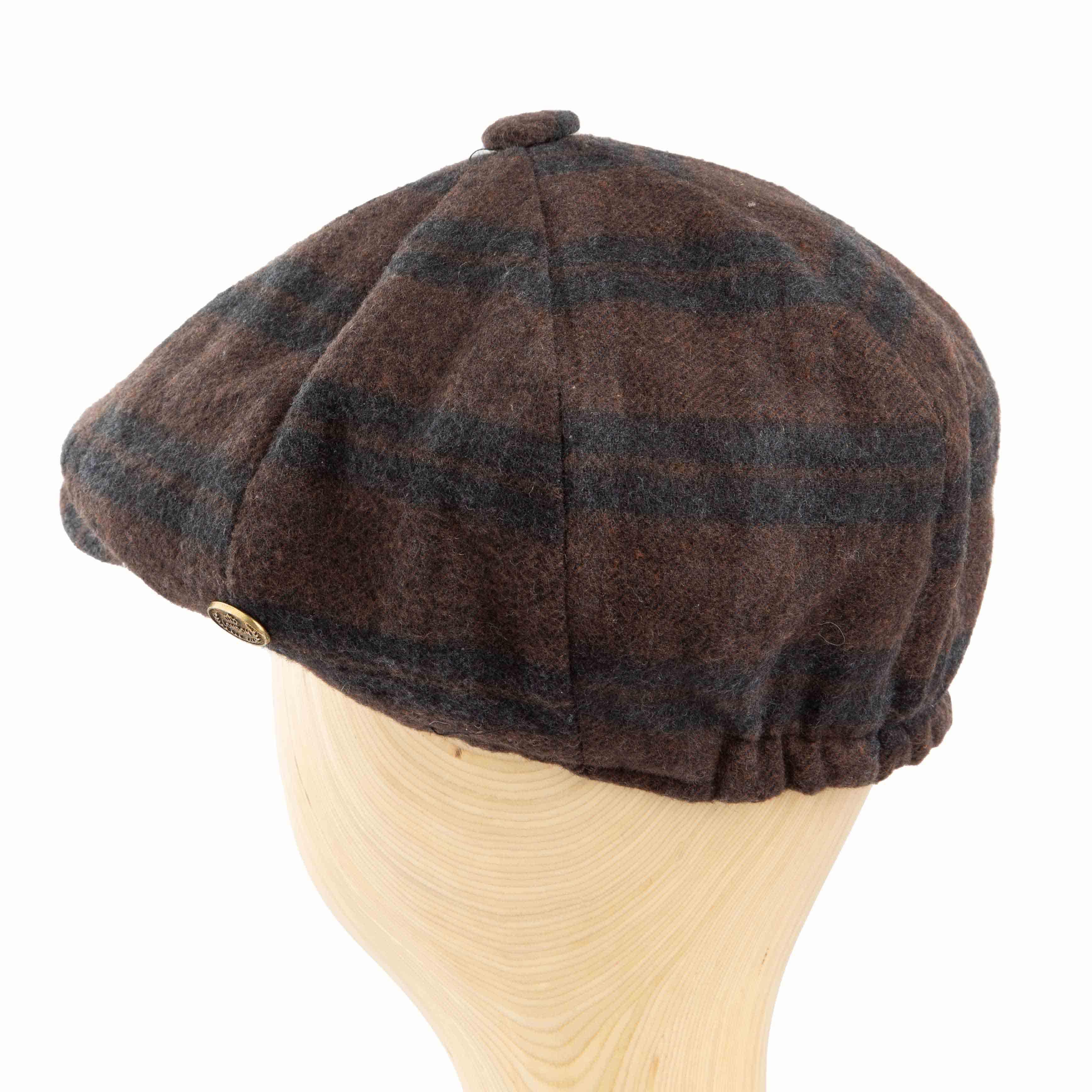 Brown plaid newsboy cap with a classic 8-panel design and button top, perfect for vintage-inspired and casual outfits."