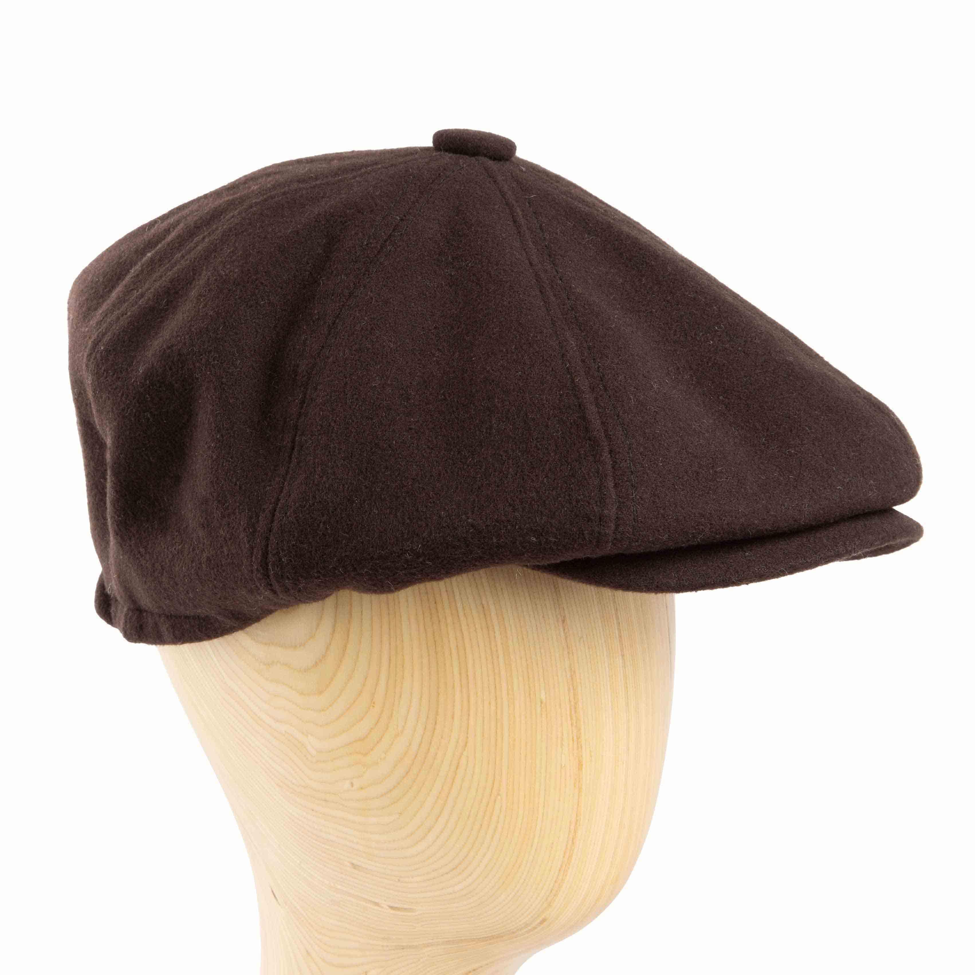 Solid brown newsboy cap with a classic 8-panel design and subtle side embellishment, perfect for vintage and casual outfits."