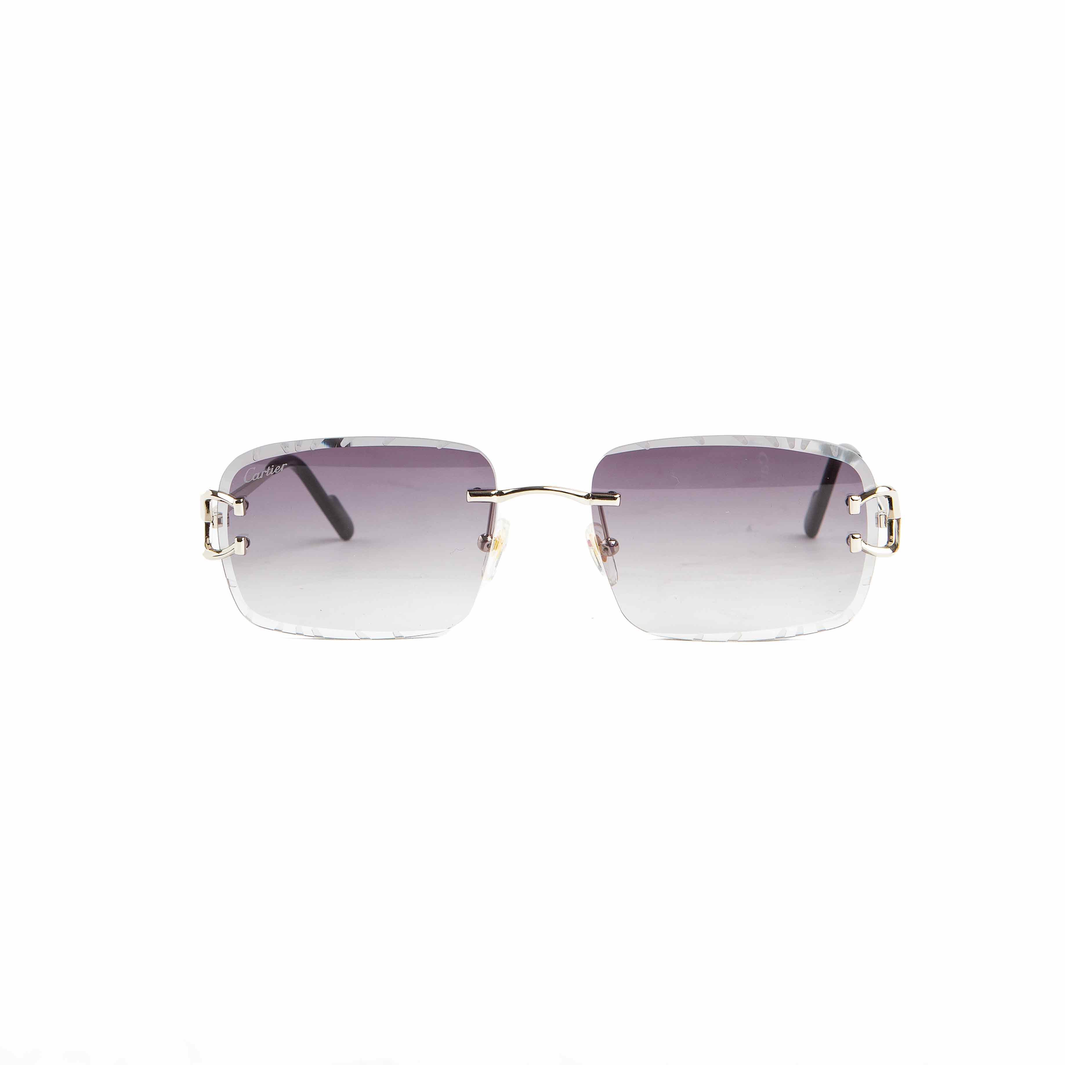 Cartier rimless gradient grey-purple lens sunglasses with gold-tone accents. Luxury eyewear for men and women.