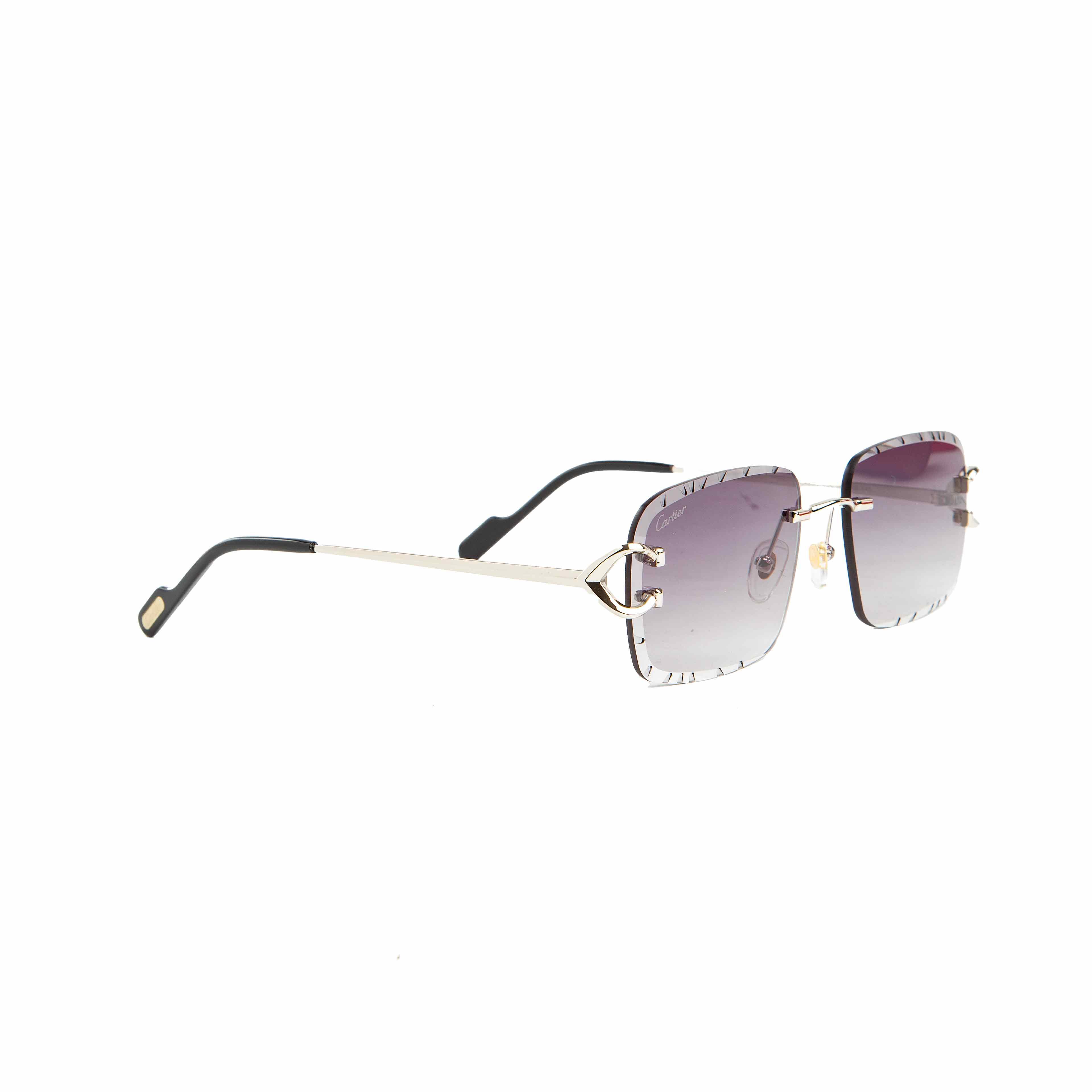 Cartier rimless gradient grey-purple lens sunglasses with gold-tone accents. Luxury eyewear for men and women."