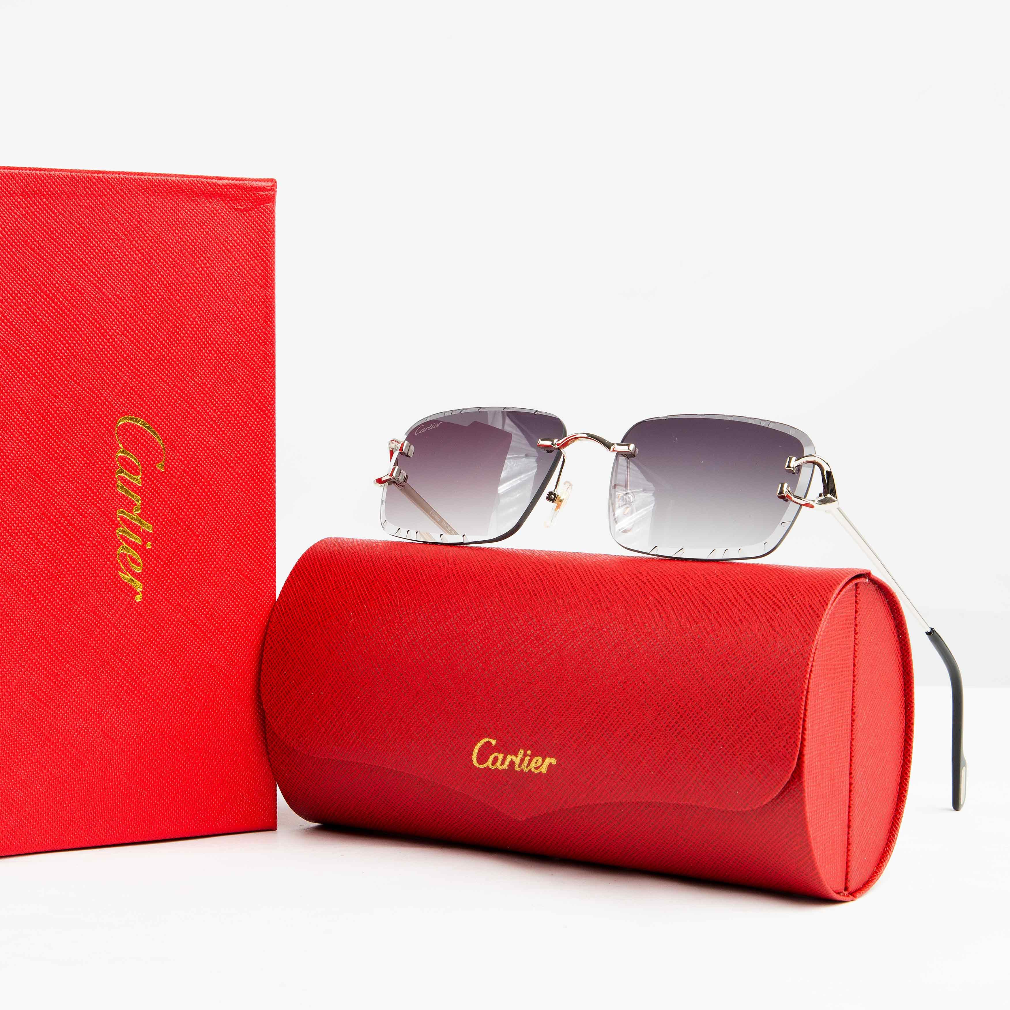 Cartier rimless gradient grey-purple lens sunglasses with gold-tone accents. Luxury eyewear for men and women."
