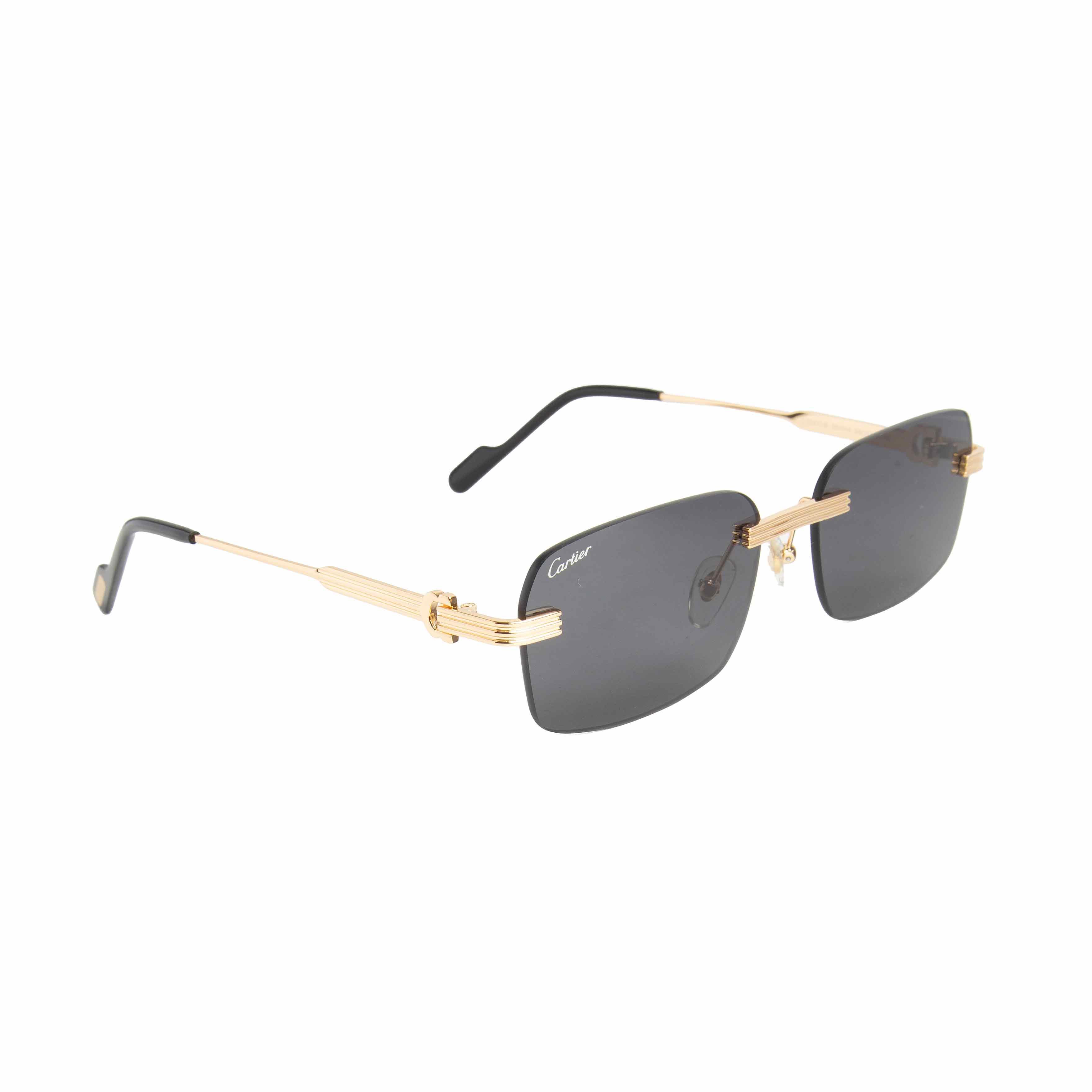 Cartier rimless grey lens rectangular sunglasses with gold-tone accents. Luxury eyewear for men and women.