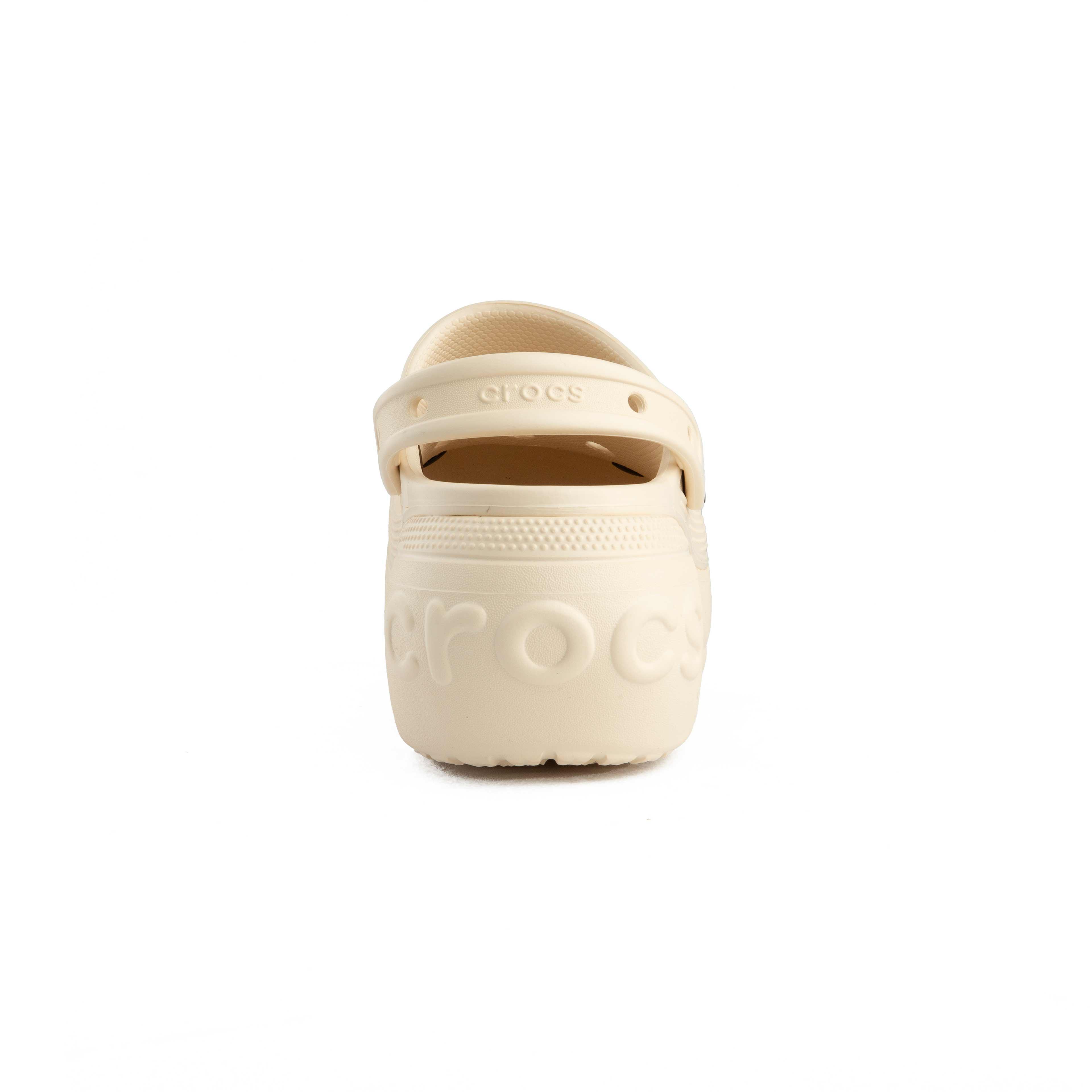 This is a pair of light beige/cream Crocs Classic 
