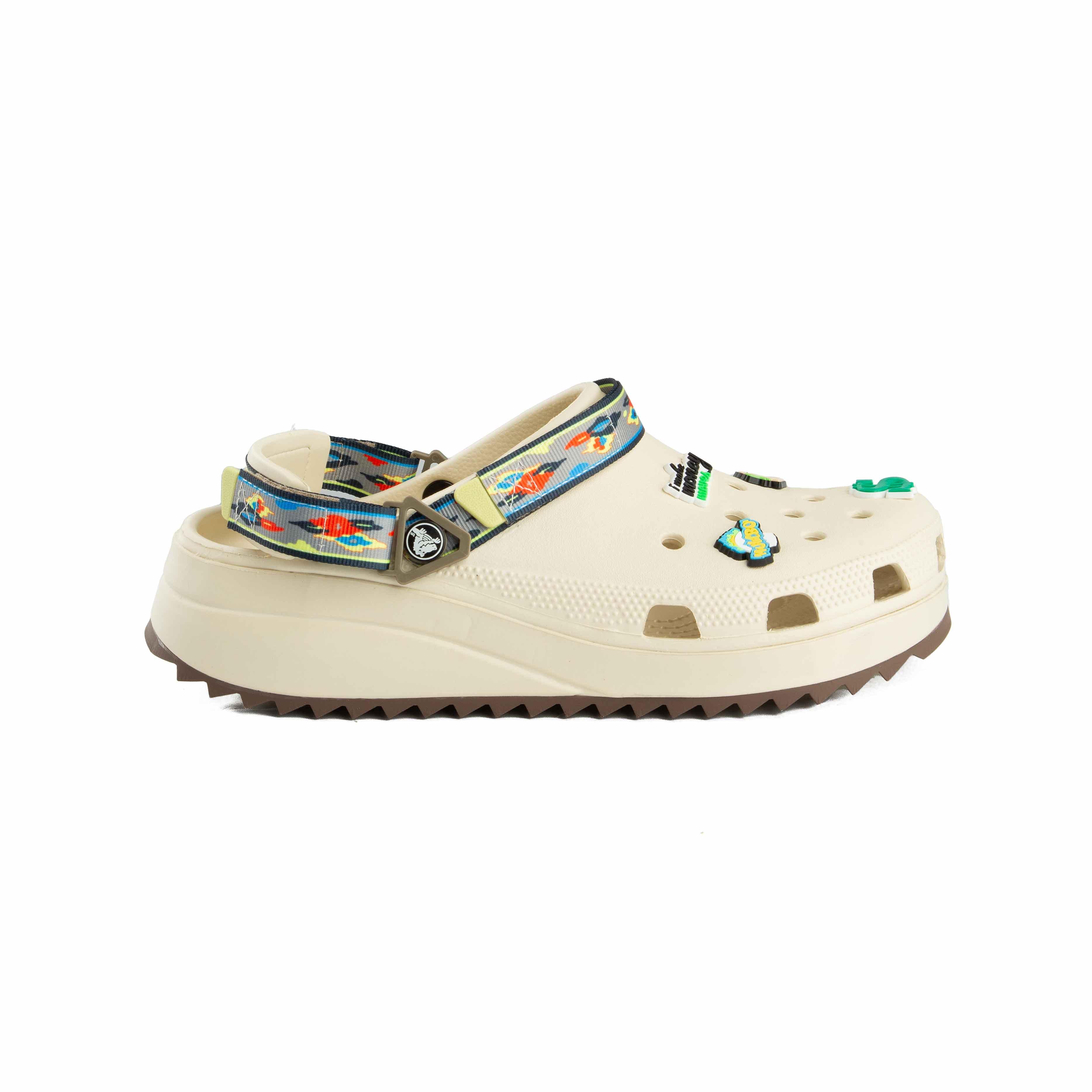 Elevate your look with the Crocs Classic Crush Platform Clogs in off-white. 