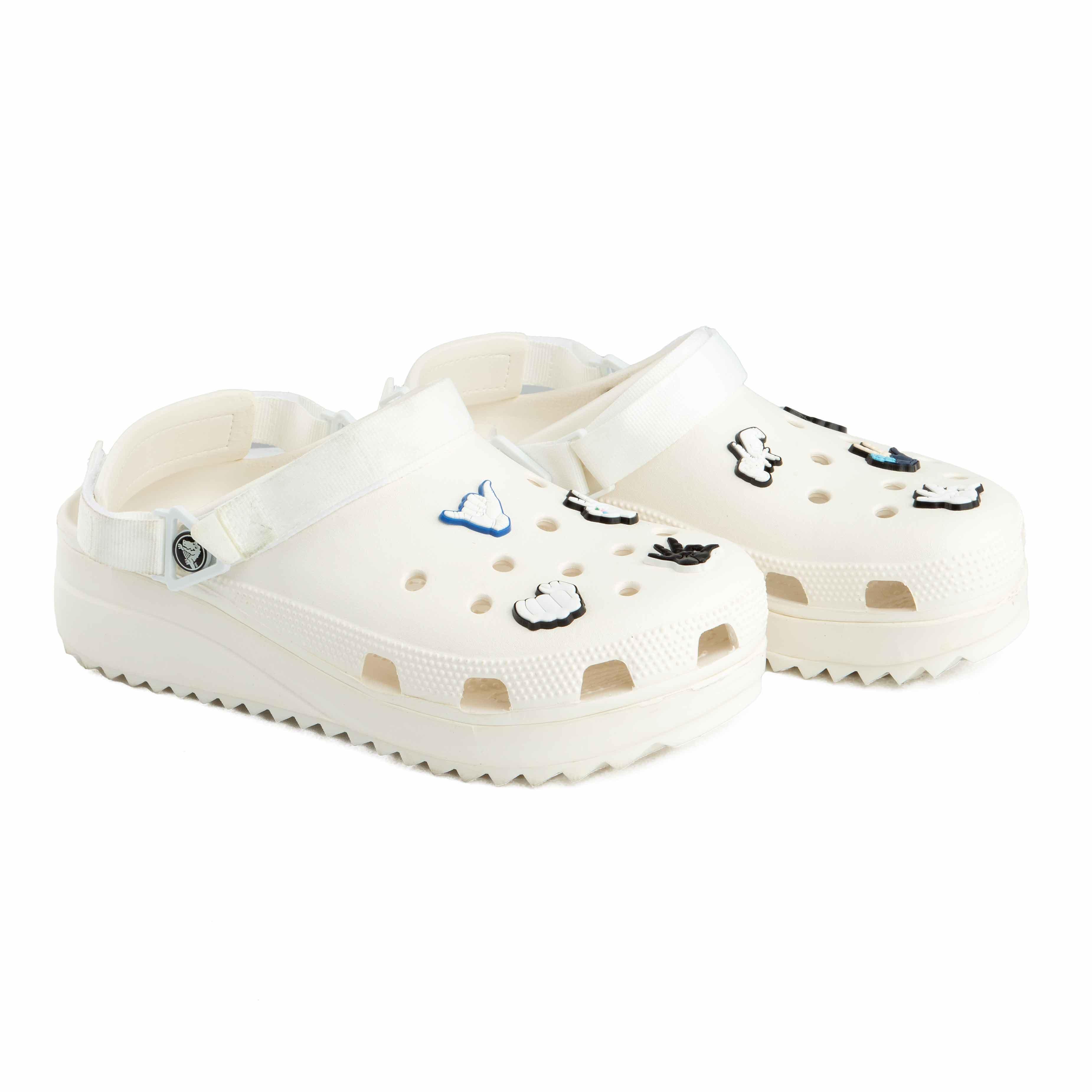 Elevate your style with the Crocs Classic Crush Platform Clogs in off-white. 