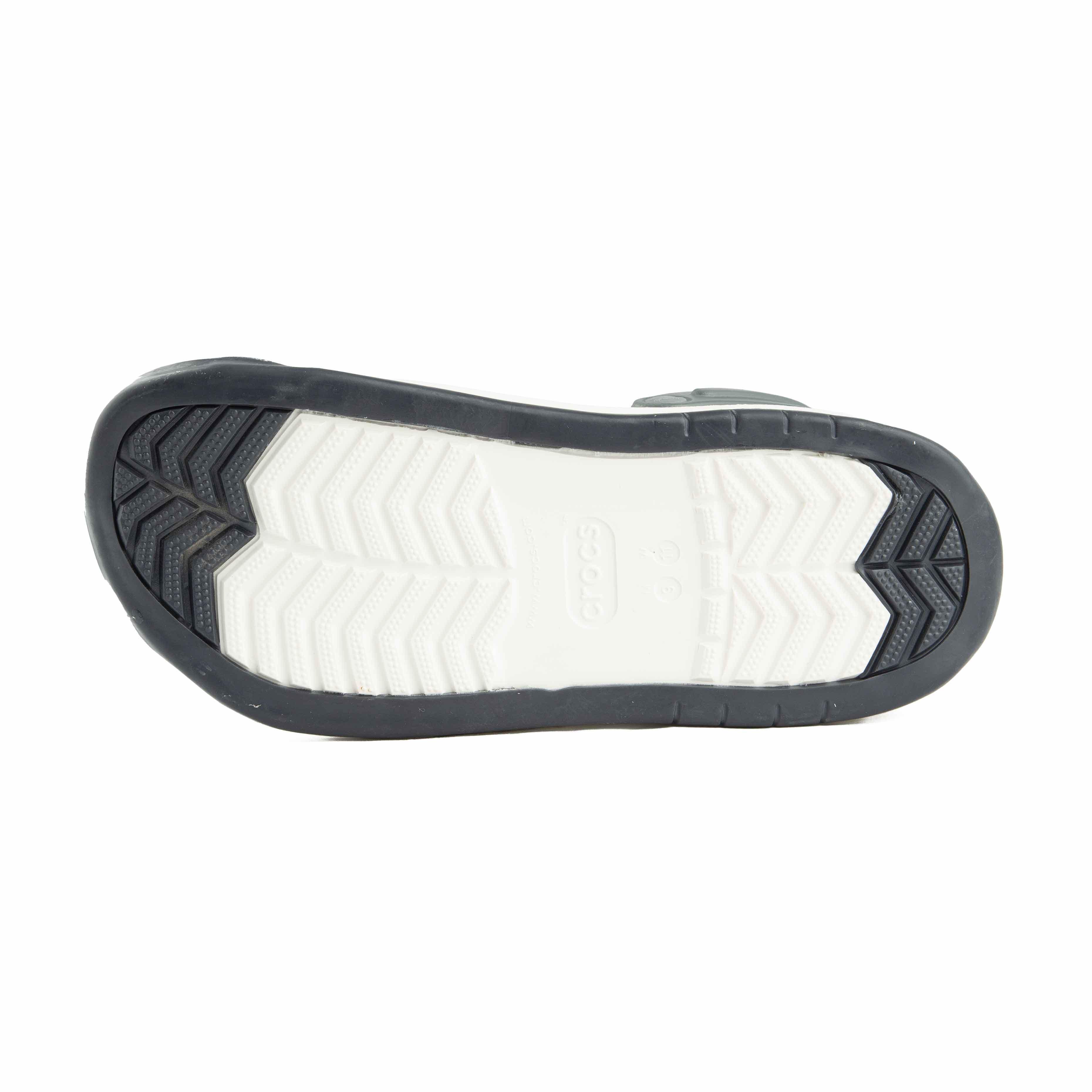 These are stylish dark grey platform clogs, designed for comfort with a contemporary edge and a touch of playfulness.