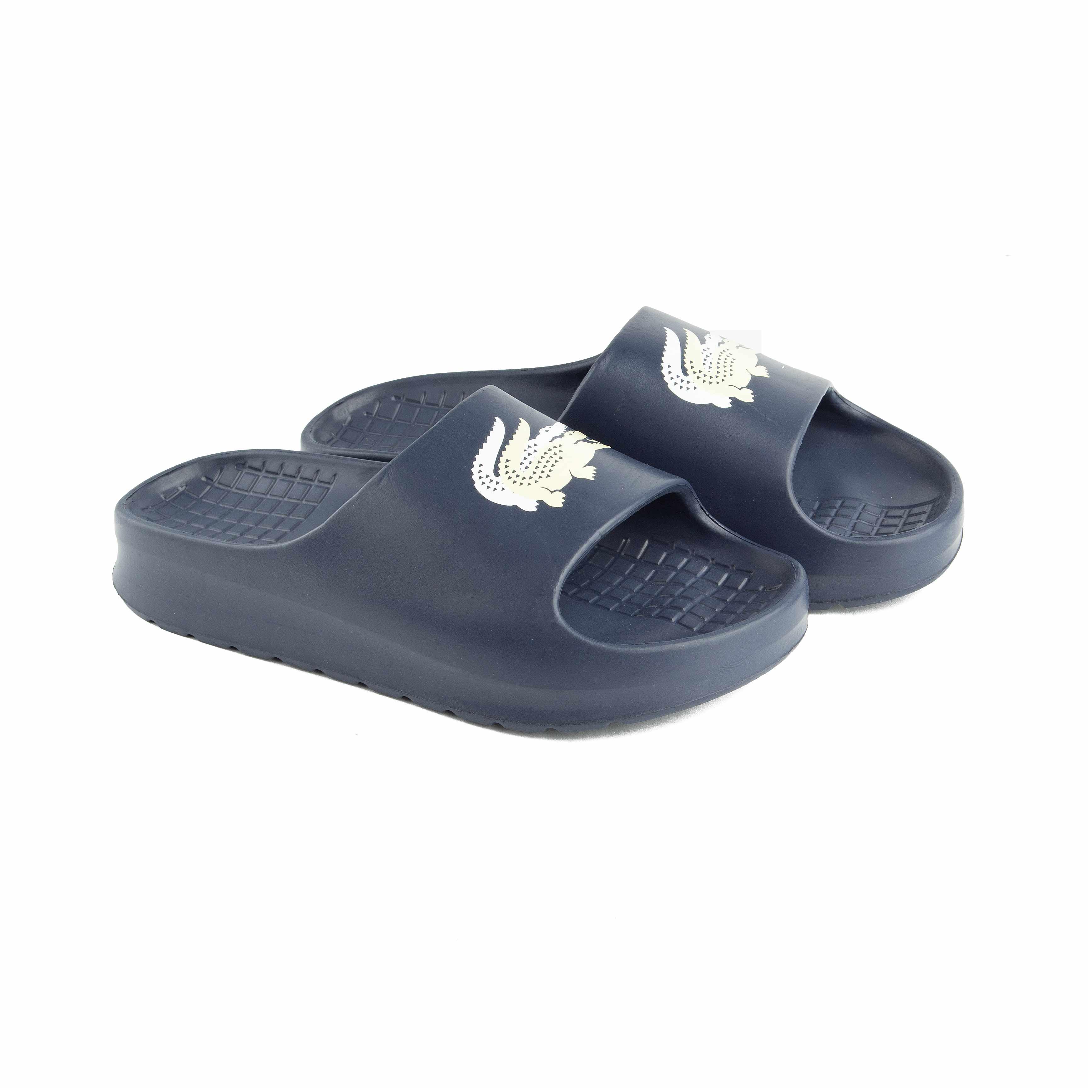 This is a pair of classic slide sandals from Lacoste.