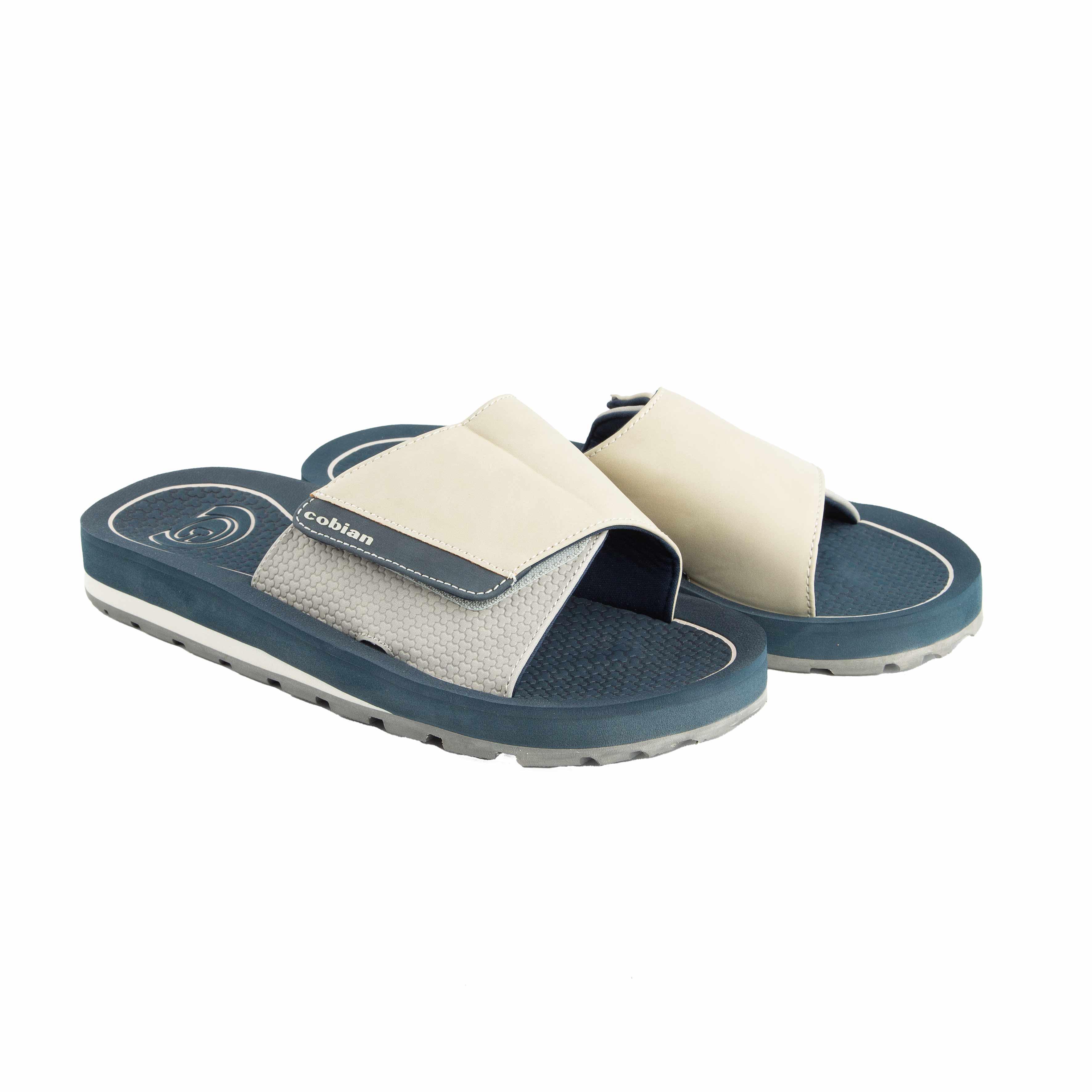 This is a pair of modern and comfortable slide sandals with a multi-tone design. 