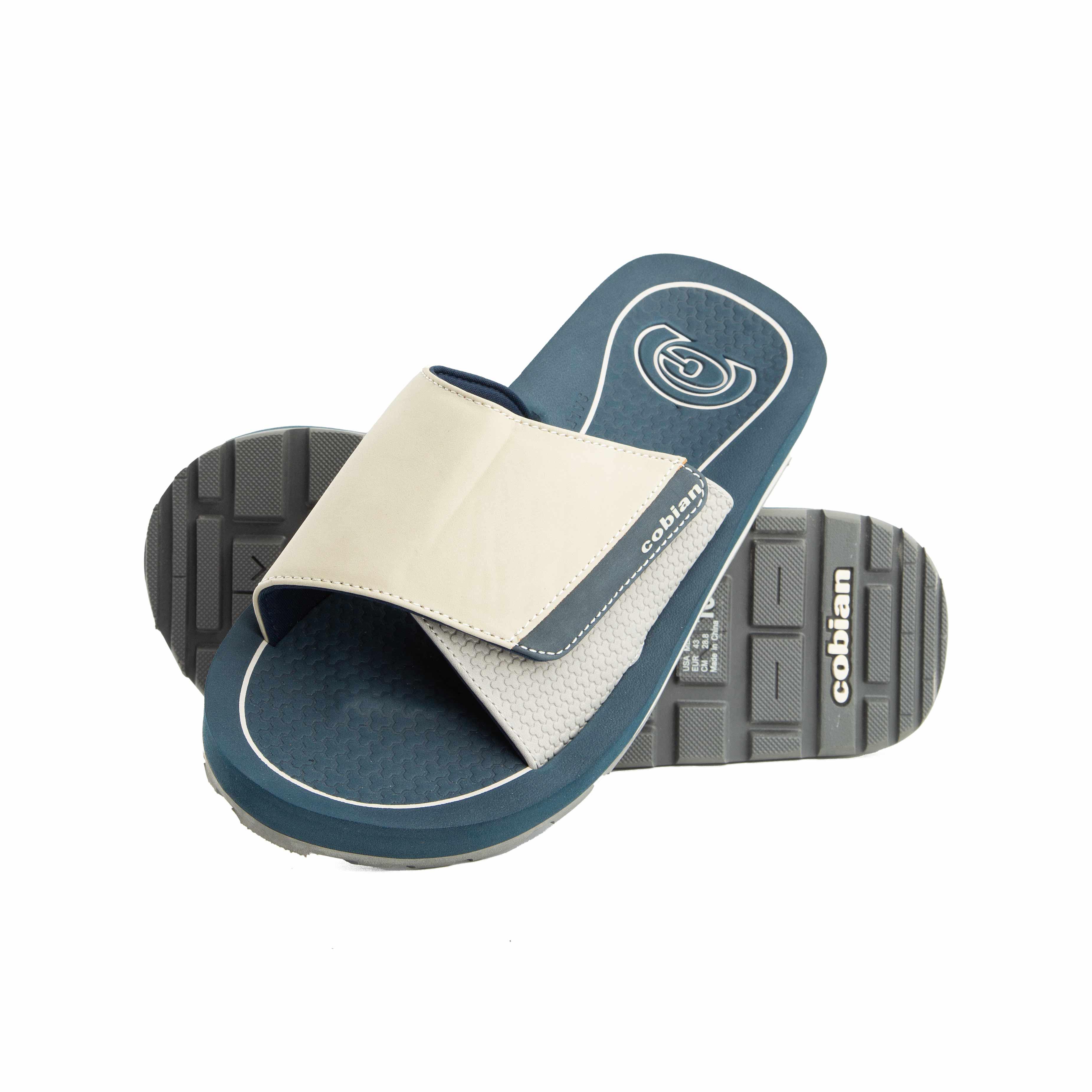 This is a pair of modern and comfortable slide sandals with a multi-tone design. 