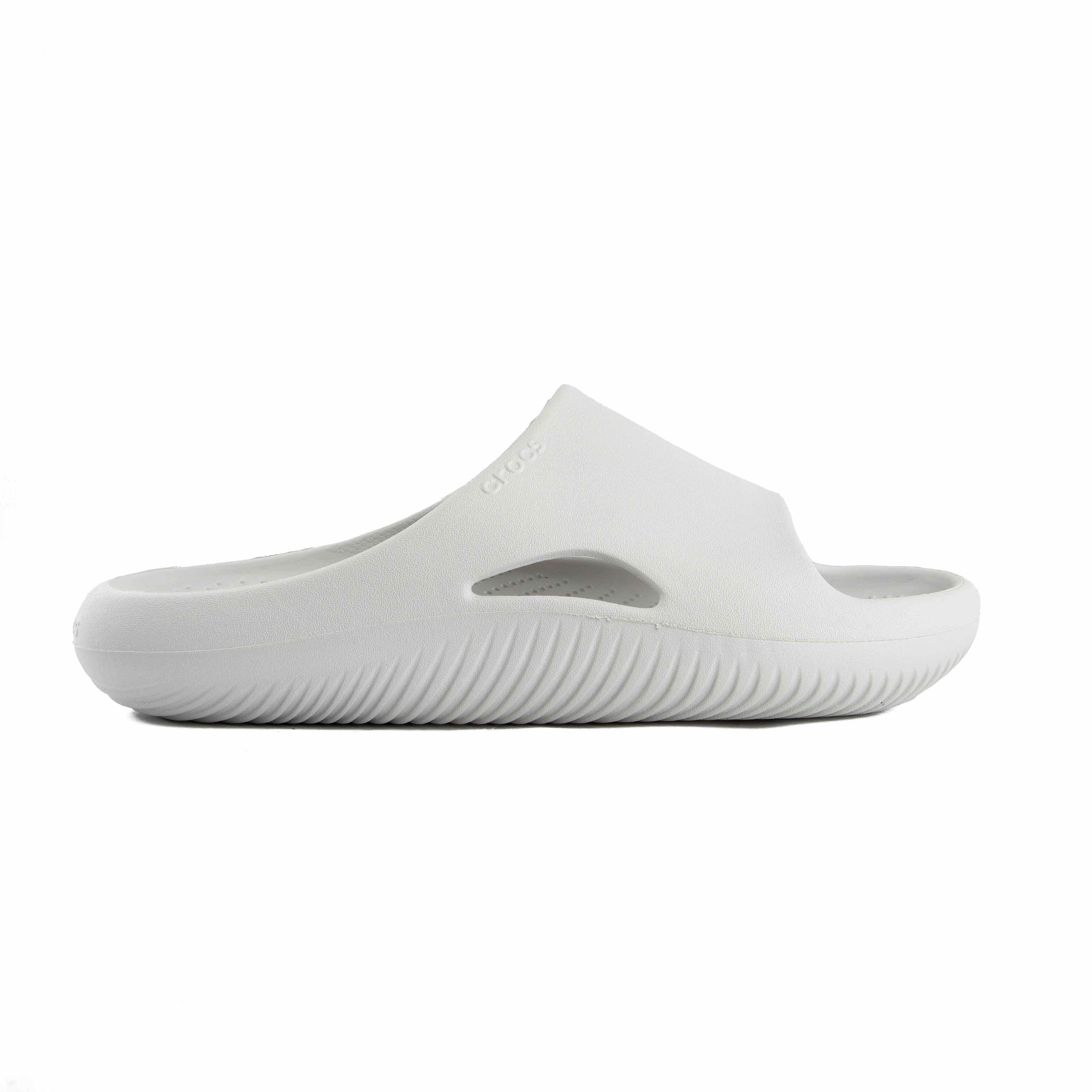 Unisex white Crocs Classic Slide Sandals for ultimate comfort and minimalist style. 