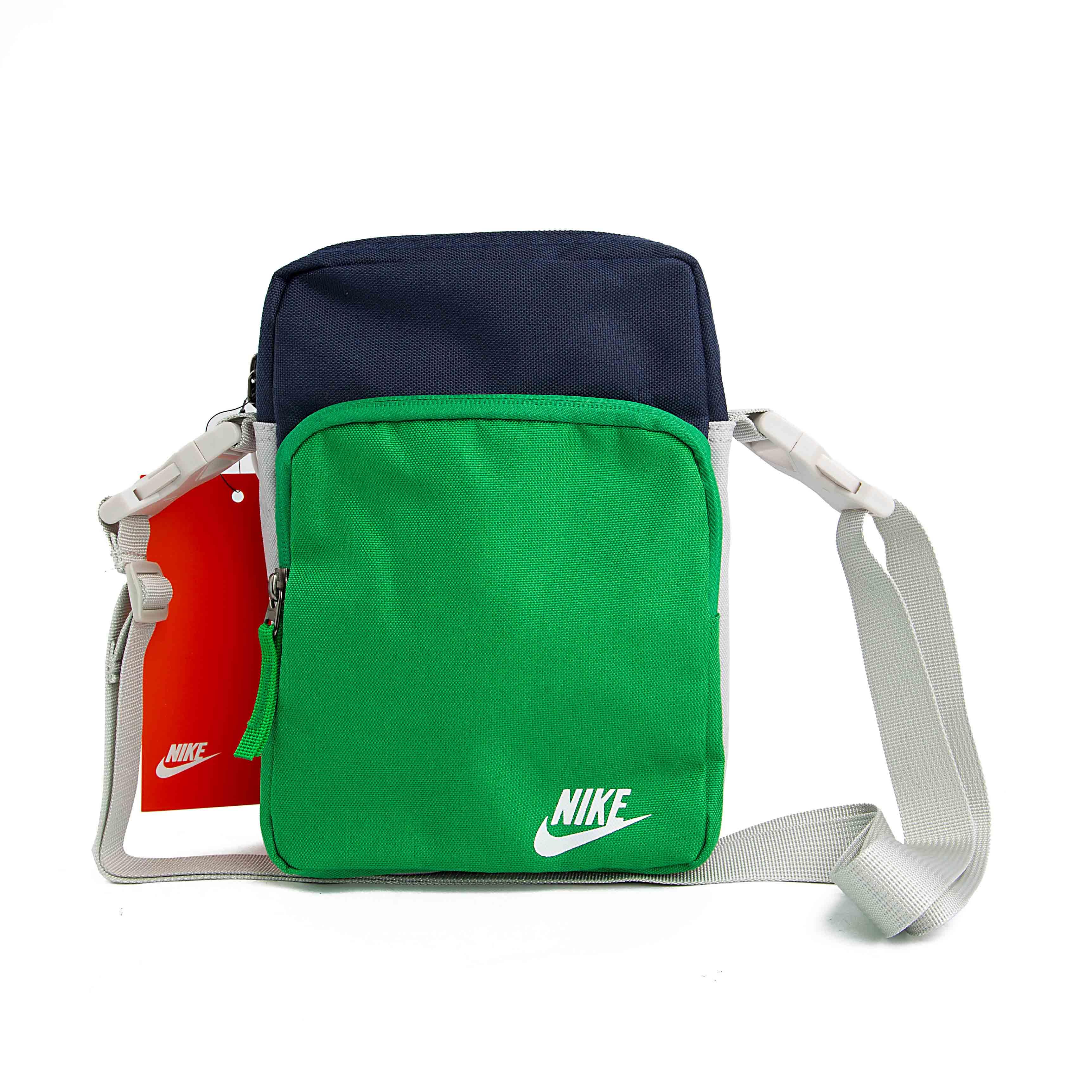 The North Face navy grey shoulder bag, flyweight crossbody, adjustable strap, unisex, durable, men's and women's small item pouch, sports accessory.
