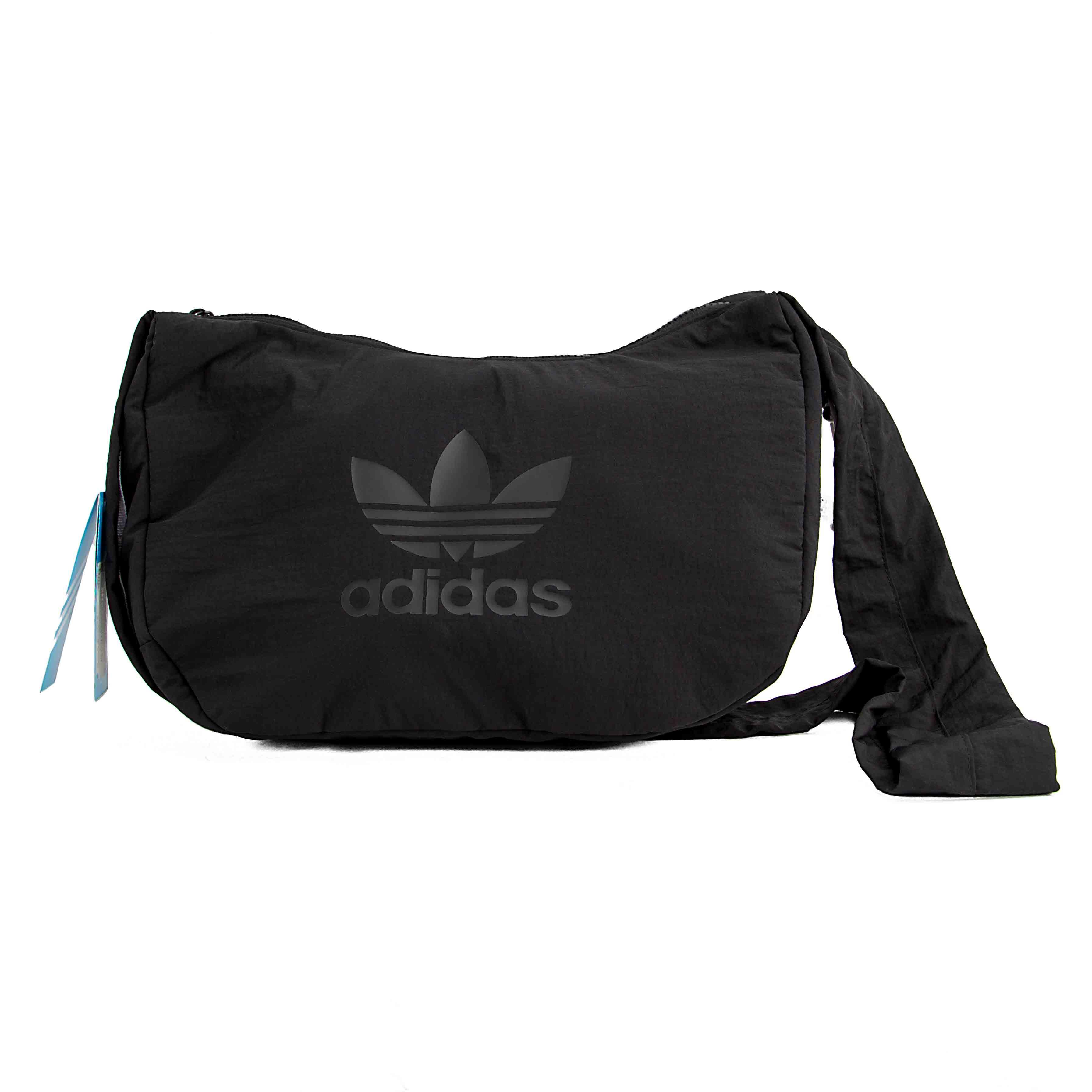 Shop the black adidas Originals Adicolor messenger bag. Features a tonal Trefoil logo and a lightweight, casual design. Perfect for everyday essentials.