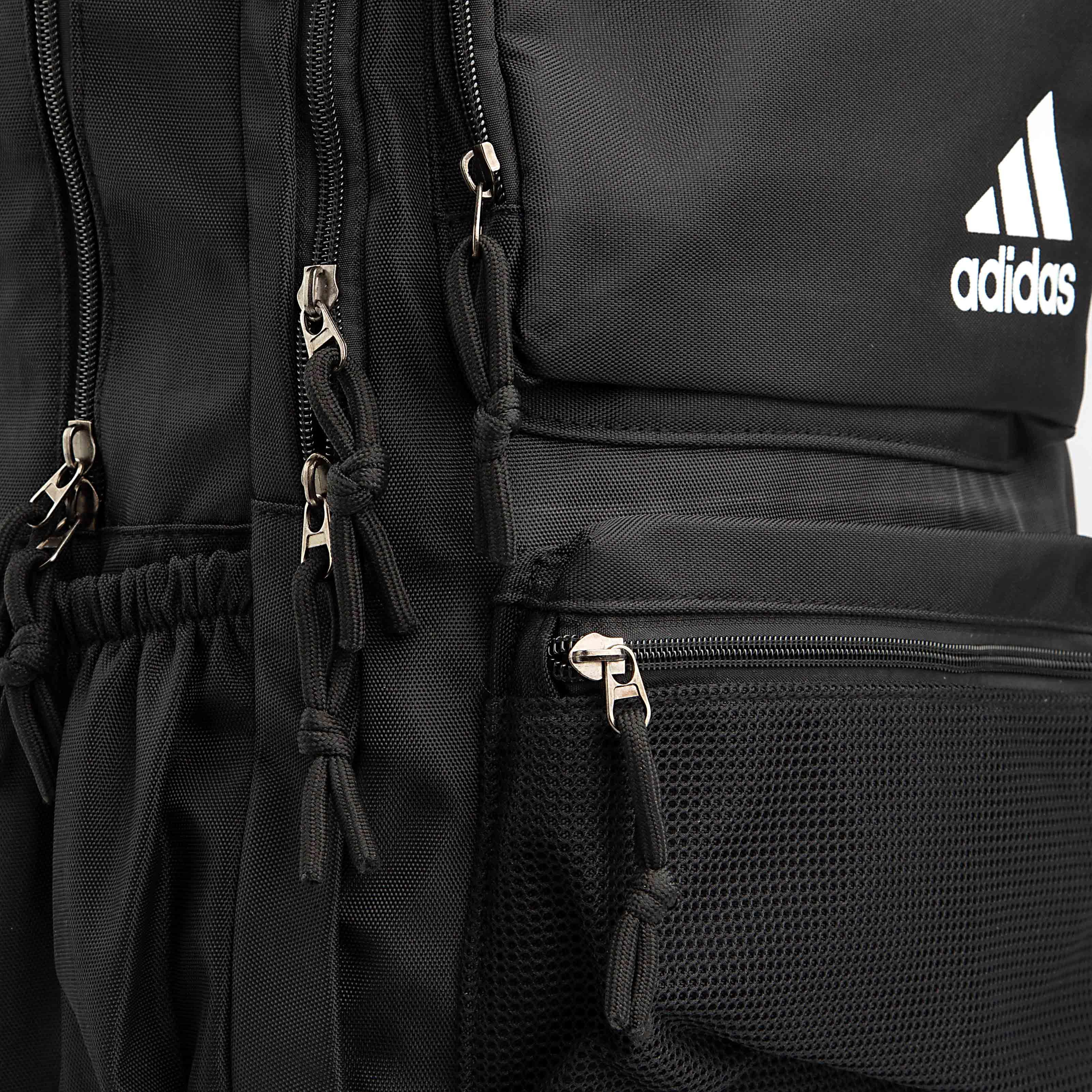 This is a classic black backpack from adidas, featuring the iconic white "adidas" logo and the three stripes on the front.