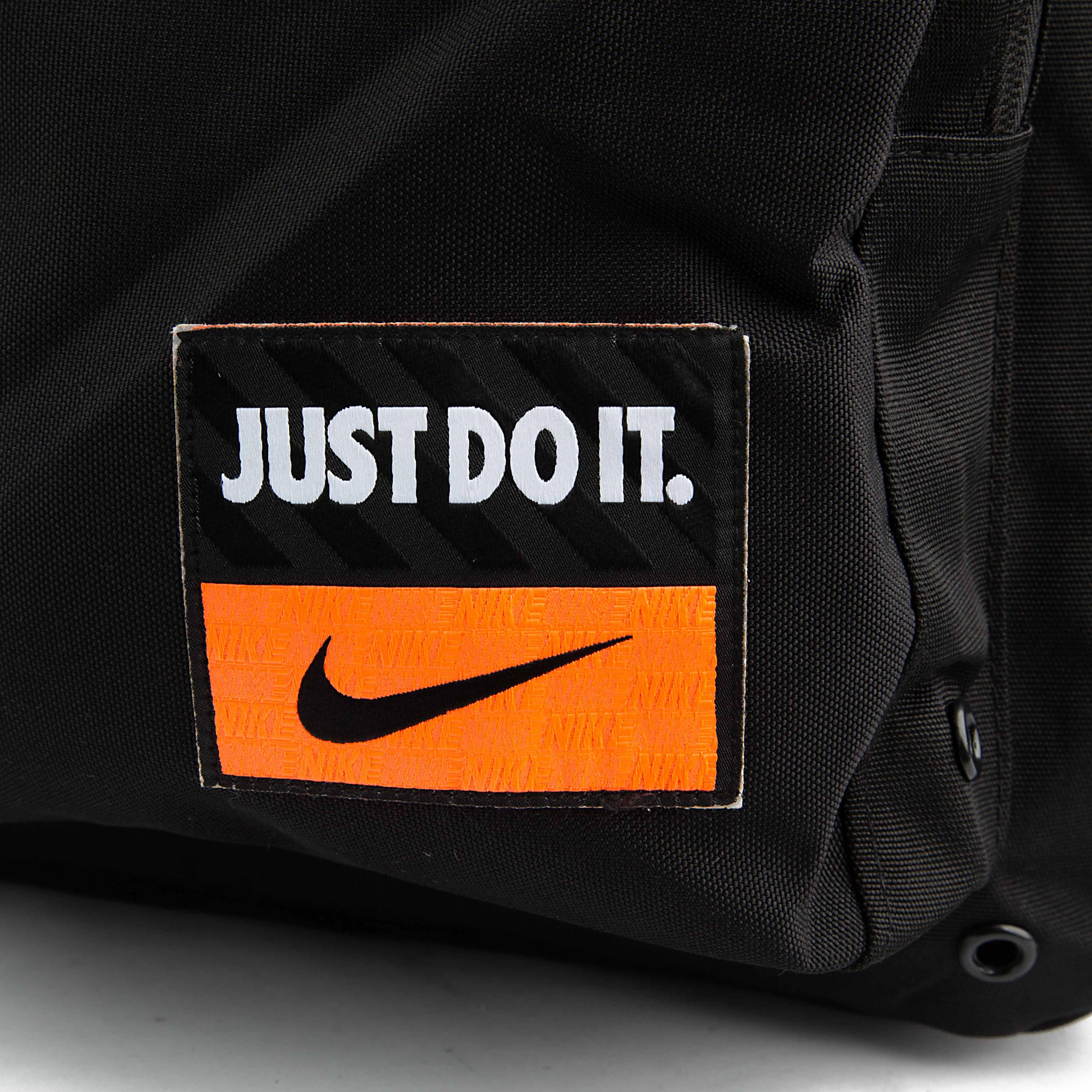 This is a durable, multi-pocket backpack from Nike, designed for practicality and organization. 