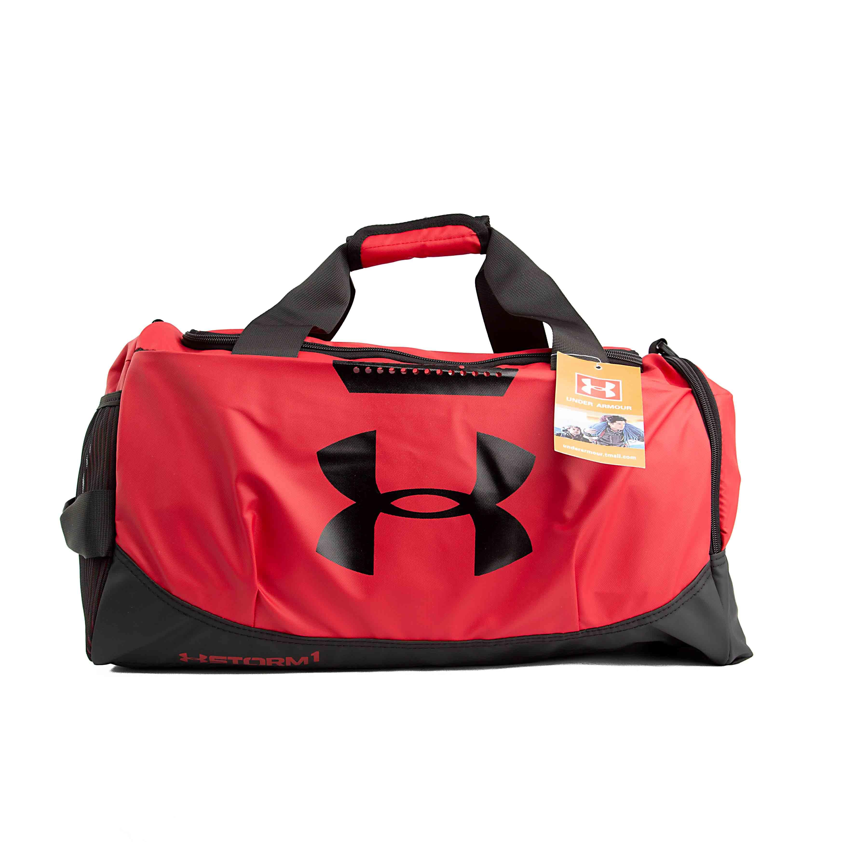Durable red Under Armour Undeniable 5.0 Duffel Bag with UA Storm water-resistant technology. Perfect for gym, sports, and travel.