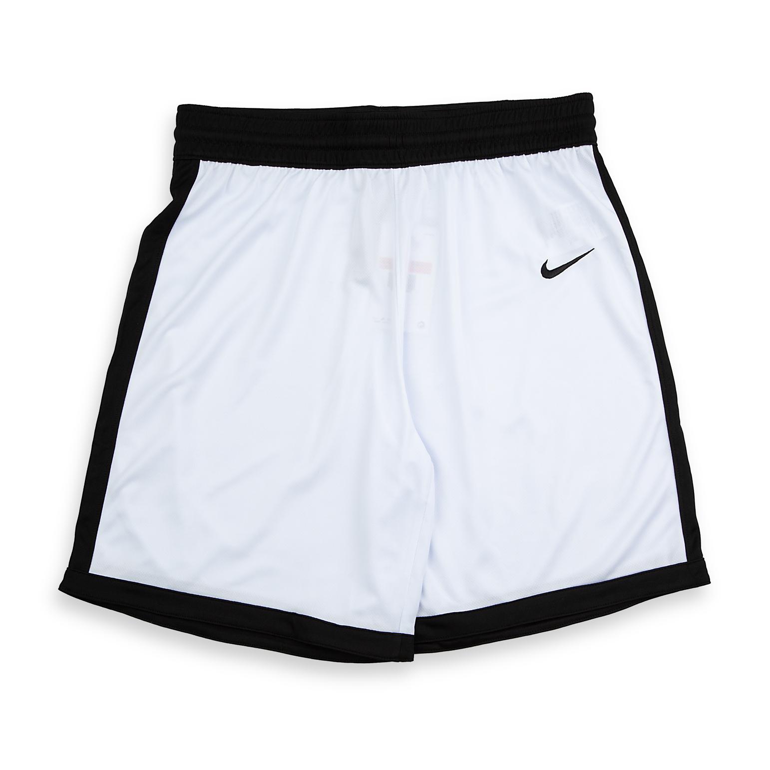 Nike Dri-FIT basketball shorts in white with black trim, and an embroidered black swoosh.
