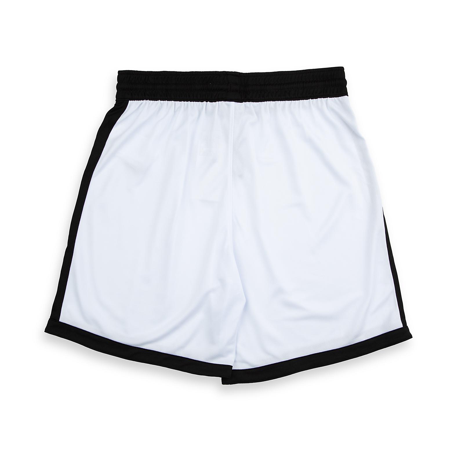 Nike Dri-FIT basketball shorts in white with black trim, and an embroidered black swoosh.