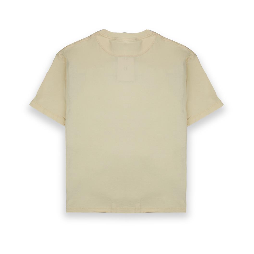 A plain cream-colored Nike t-shirt with a minimalist, clean design.