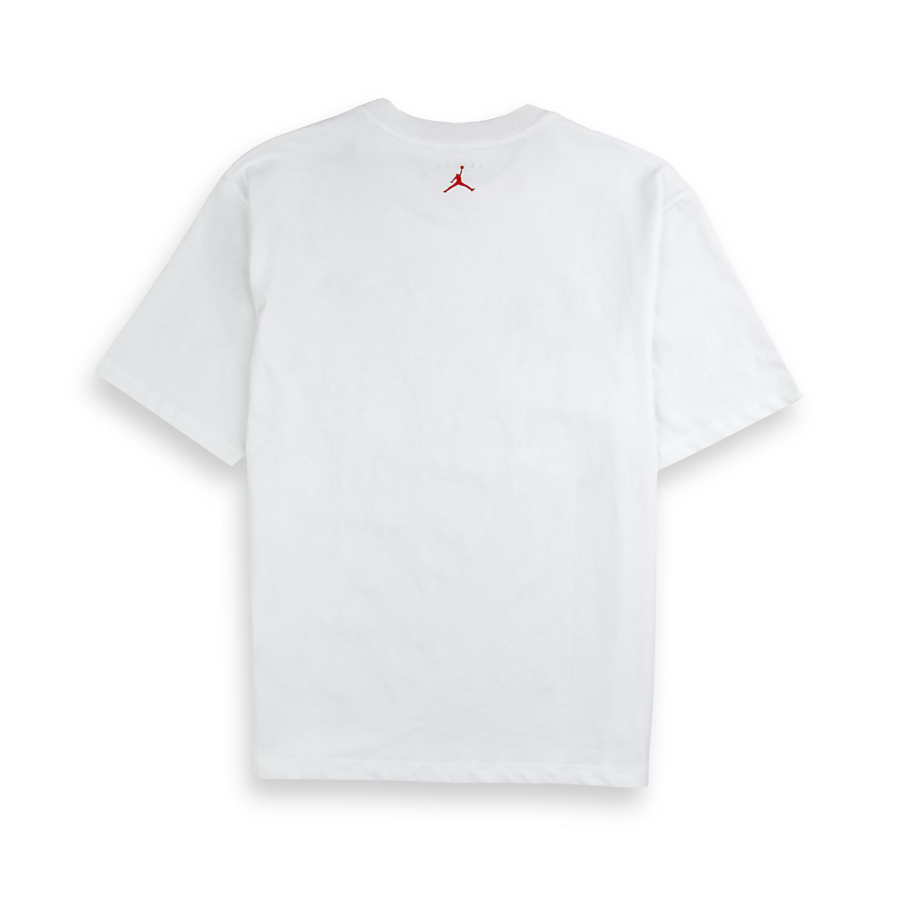 A white Jordan Flight Heritage T-shirt with a small embroidered winged shoe logo on the chest.
