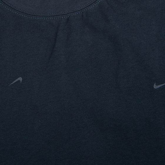 Nike x Jacquemus dark navy blue Dri-FIT t-shirt with all-over debossed logos."