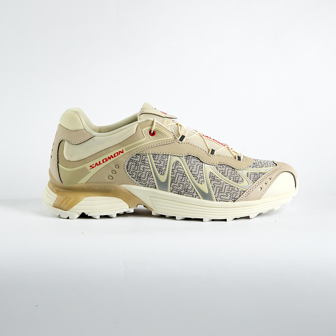 style with the Salomon XT-Whisper Panhui. These unisex sneakers blend trail-ready tech with modern aesthetics for unmatched comfort and versatility. Perfect for urban adventures and celebrating heritage