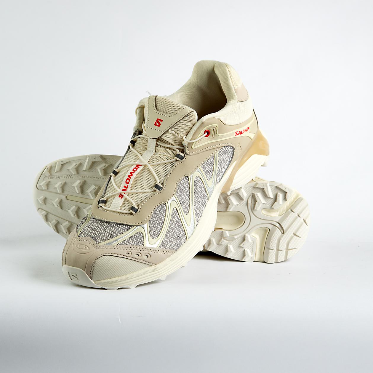 style with the Salomon XT-Whisper Panhui. These unisex sneakers blend trail-ready tech with modern aesthetics for unmatched comfort and versatility. Perfect for urban adventures and celebrating heritage