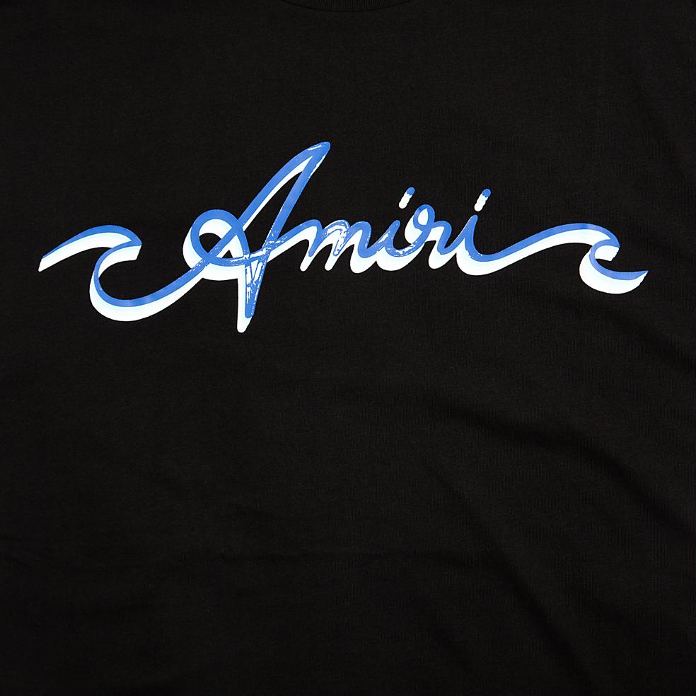 Black Amiri unisex t-shirt with a central white and blue script logo graphic.