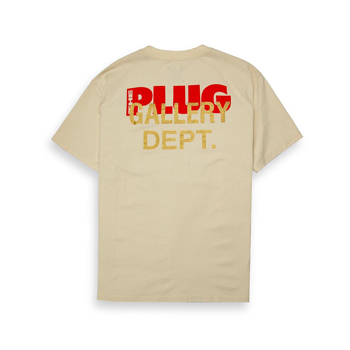 This is a short-sleeve, crew-neck T-shirt from the brand GALLERY DEPT. The garment features a prominent vintage-style, oval graphic print on the front.