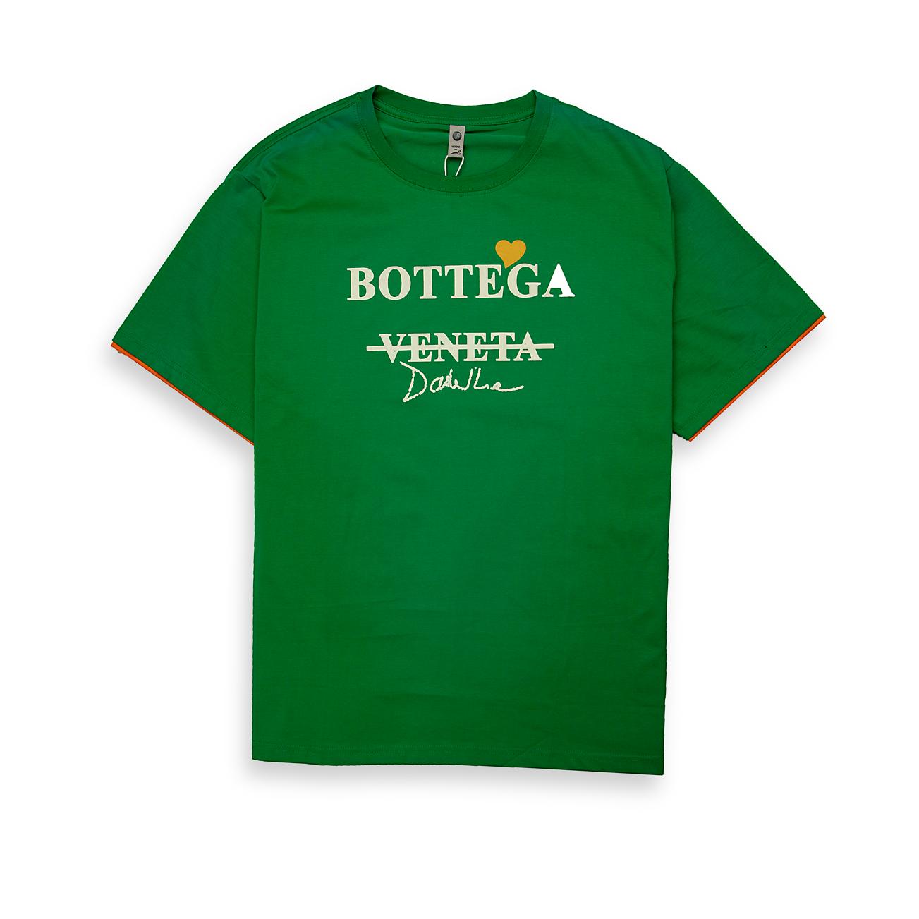 This is a relaxed-fit, short-sleeve cotton jersey T-shirt featuring a distinctive graphic print on the chest.