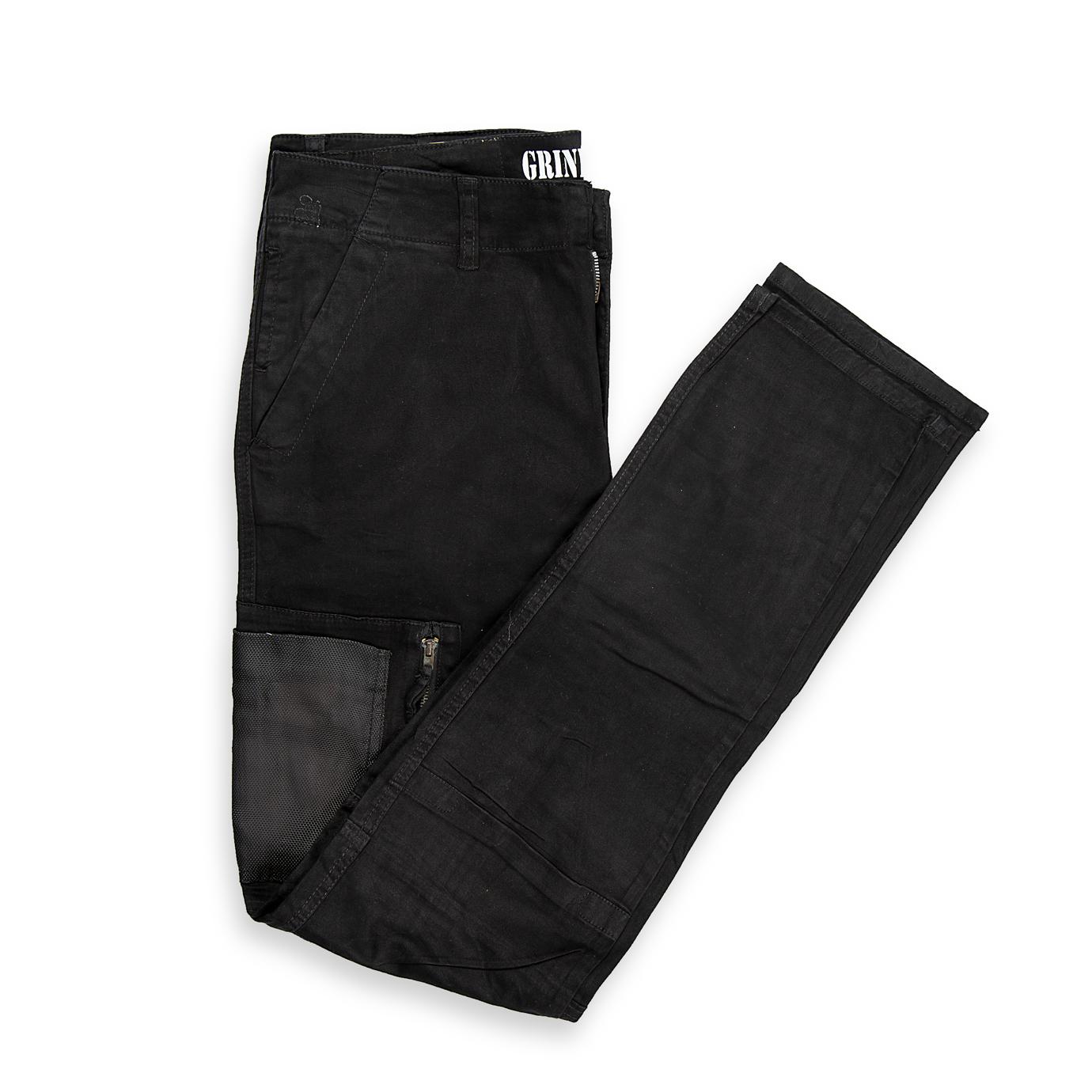 These are a pair of modern, slim-fit cargo pants (or utility trousers) in a solid black fabric. They feature a contemporary design that blends workwear utility with a streetwear aesthetic.