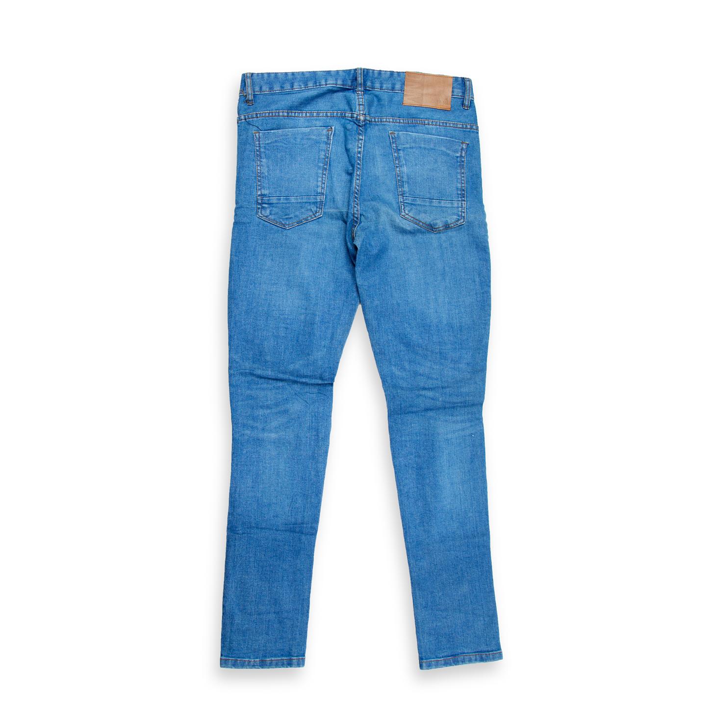 These contemporary skinny-fit jeans blend urban edge with everyday comfort. Crafted from a medium-wash stretch denim, they feature distinctive moto-style ribbed paneling across the upper thigh and knee, giving them a rugged biker look. 