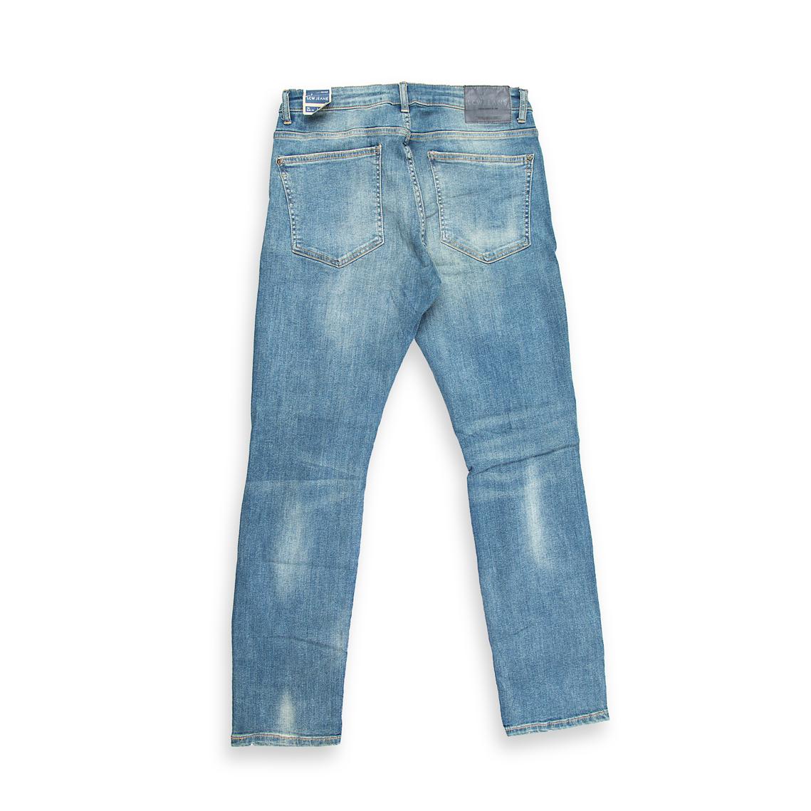 A high-fashion, streetwear-ready pair of men's jeans featuring a bright, vintage light-blue wash.
